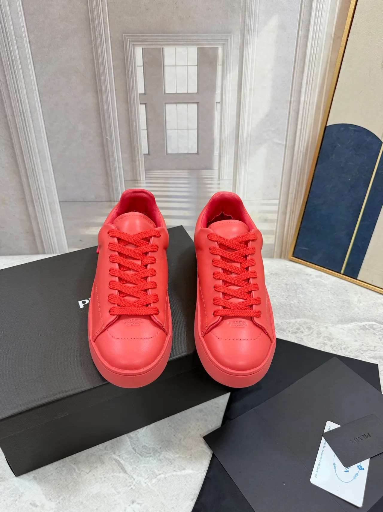 Prada Cowhide Round-Toe Low-Top Sneakers in Red · view 5