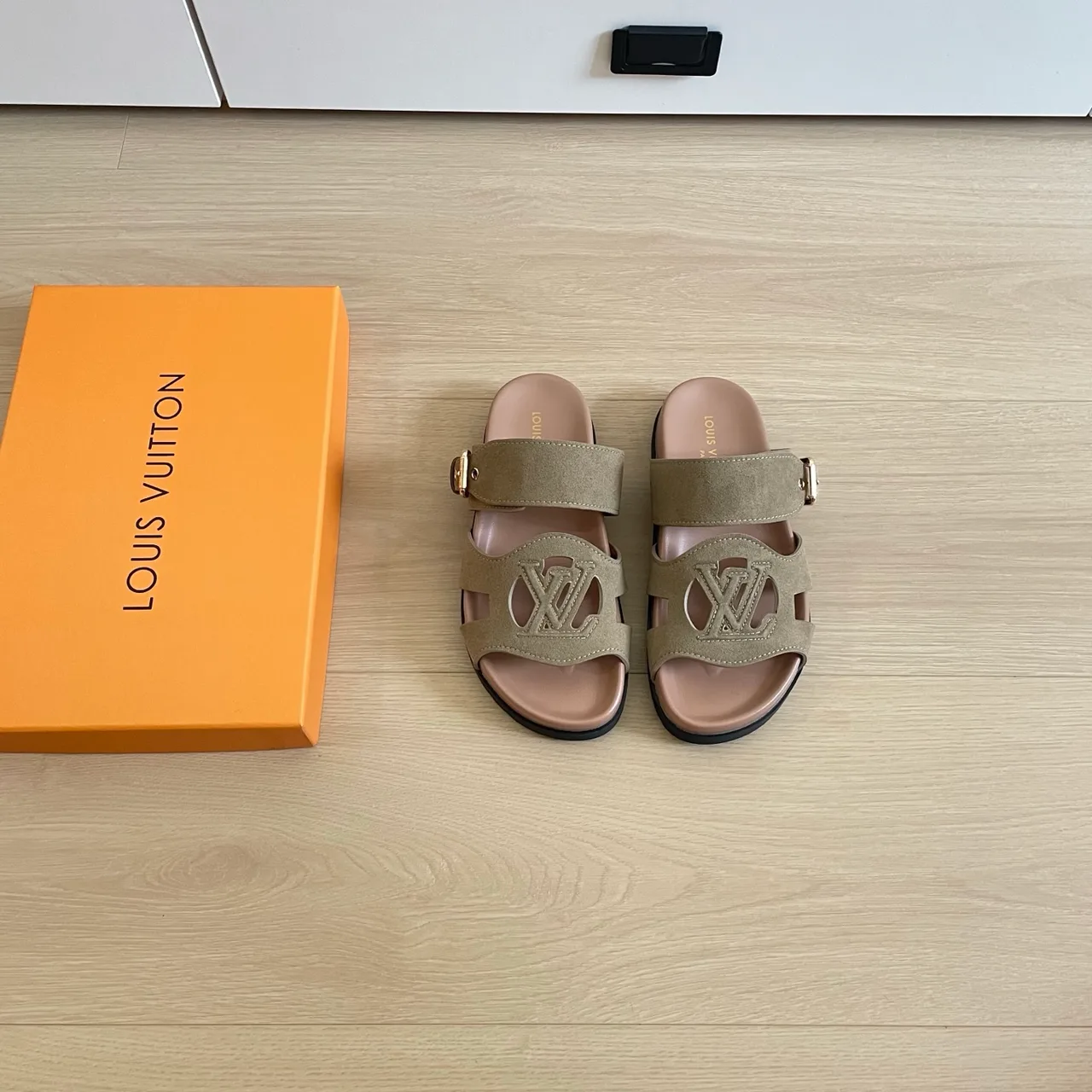 Louis Vuitton Leather Woven Buckle Sandals in Green · view 1