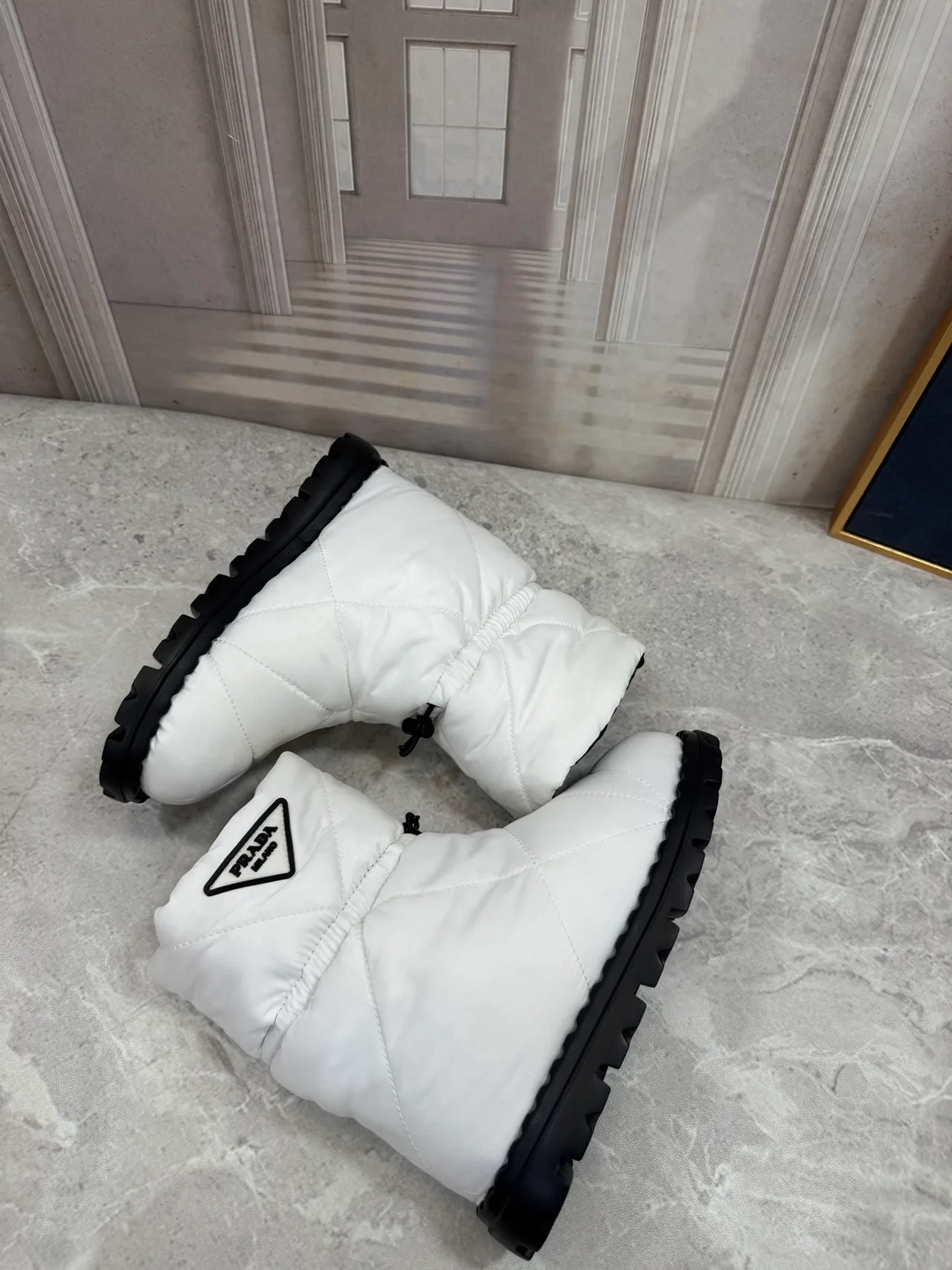 Prada Quilted Glossy Puffer Boots in White · view 8