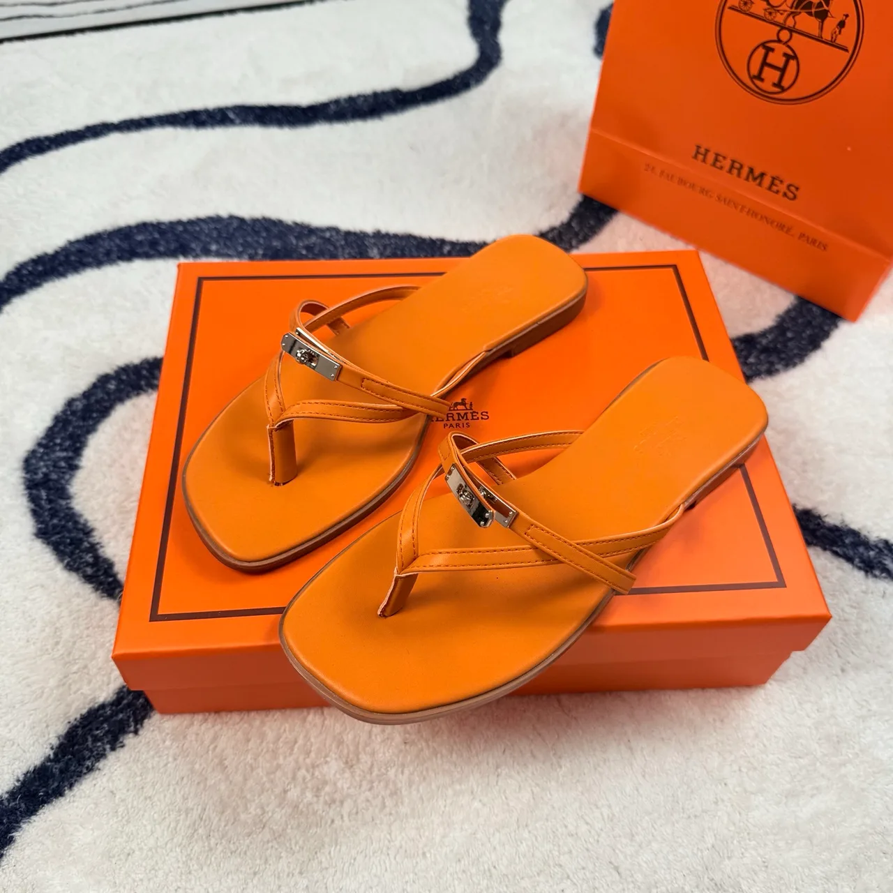 Hermes Denim Leather Flip-Flops in Orange · view 2
