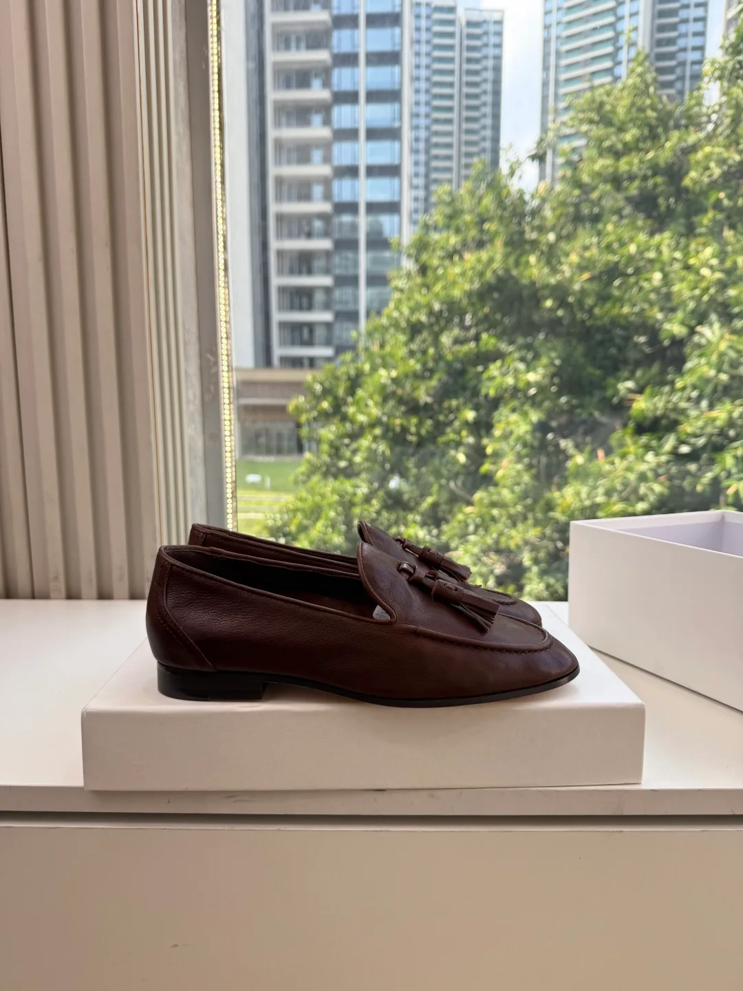 The Row Cowhide Glossy Round-Toe Tassel Loafers in Brown · view 2