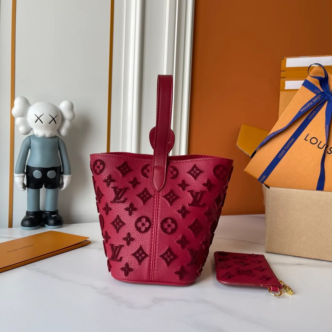 Louis Vuitton Cowhide Bucket Bag in Burgundy · view 1