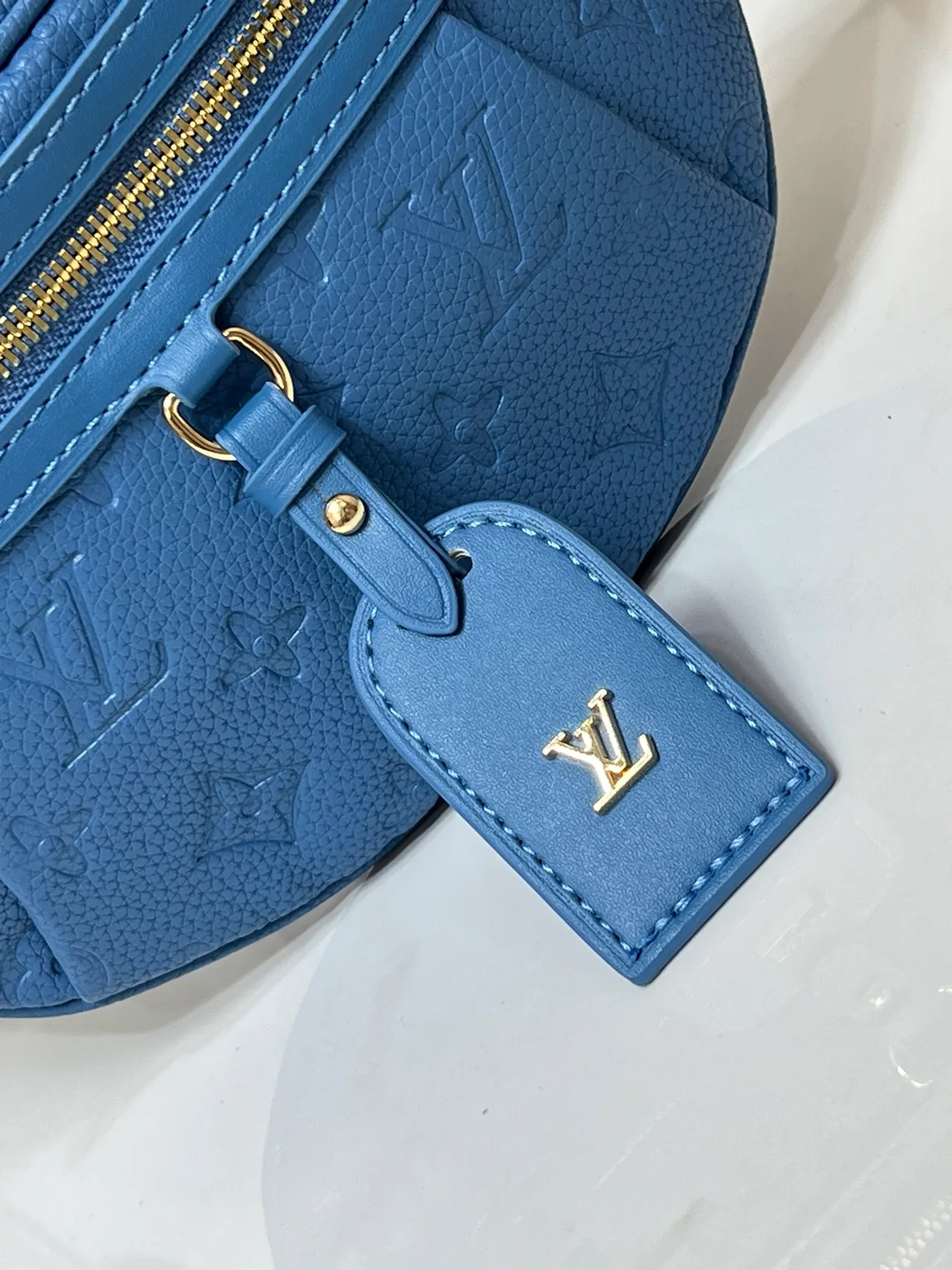 Louis Vuitton Leather Embossed Belt Bag in Blue · view 6