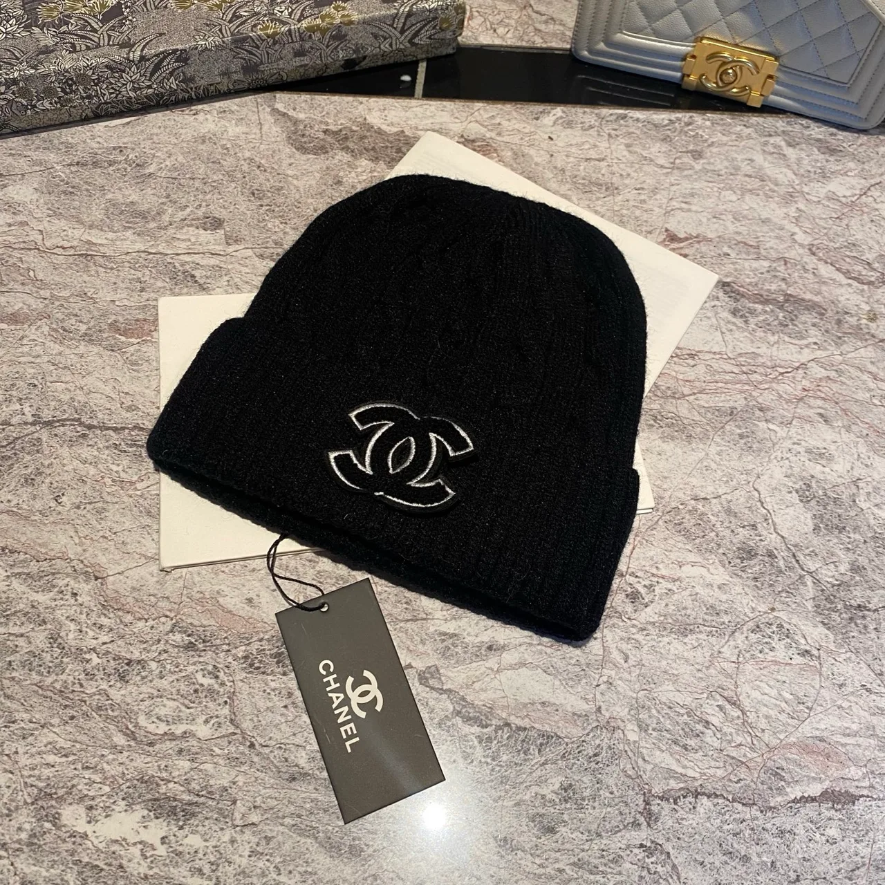 Chanel CC Cable-Knit Beanie in Brown / White / Grey / Pink / Black / Blue / Red · view 5