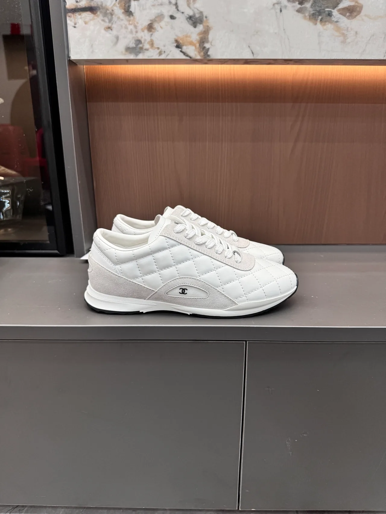 Chanel Quilted Glossy Sneakers in White · view 6