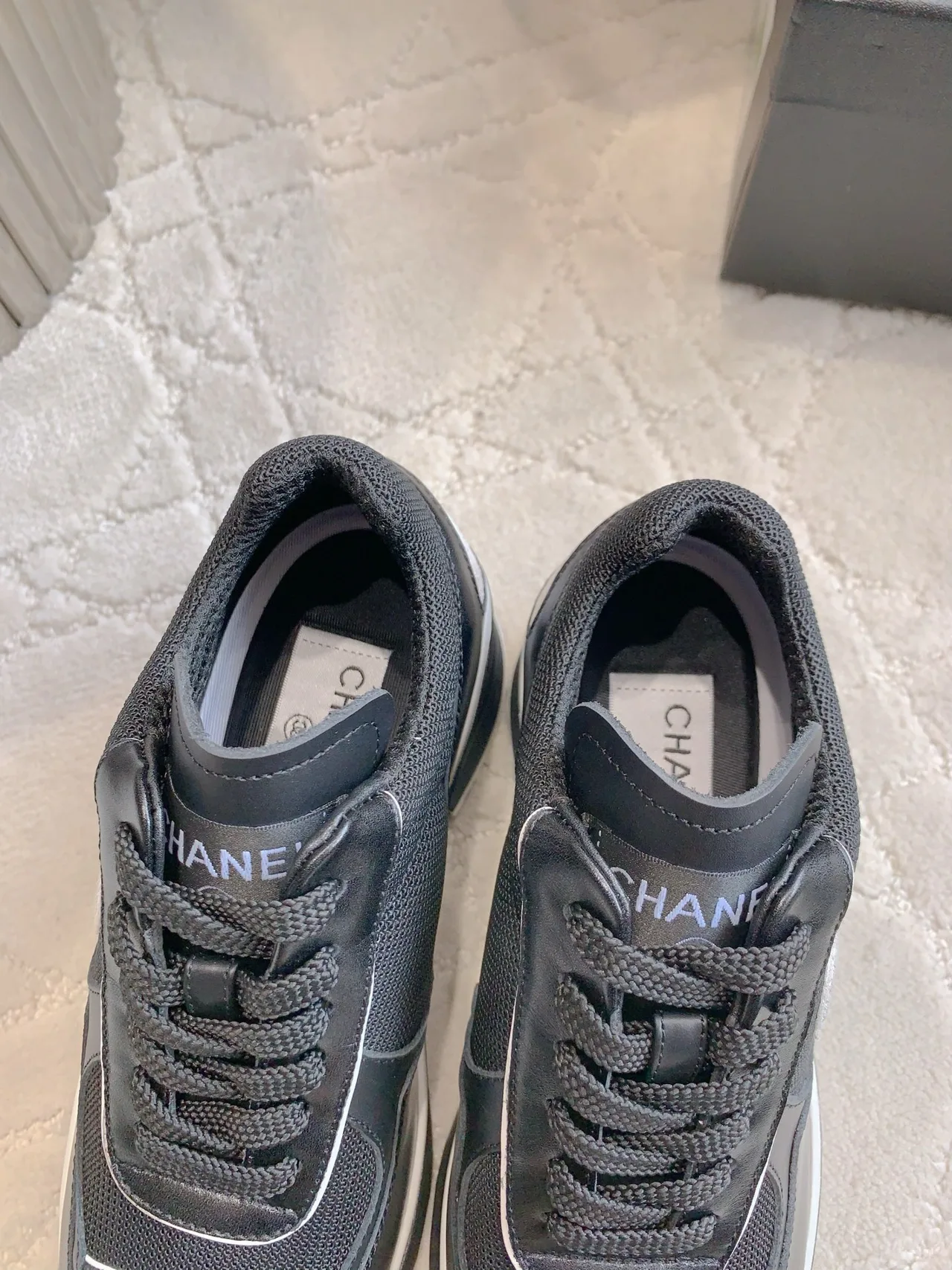 Chanel Cowhide Sneakers in Black · view 8