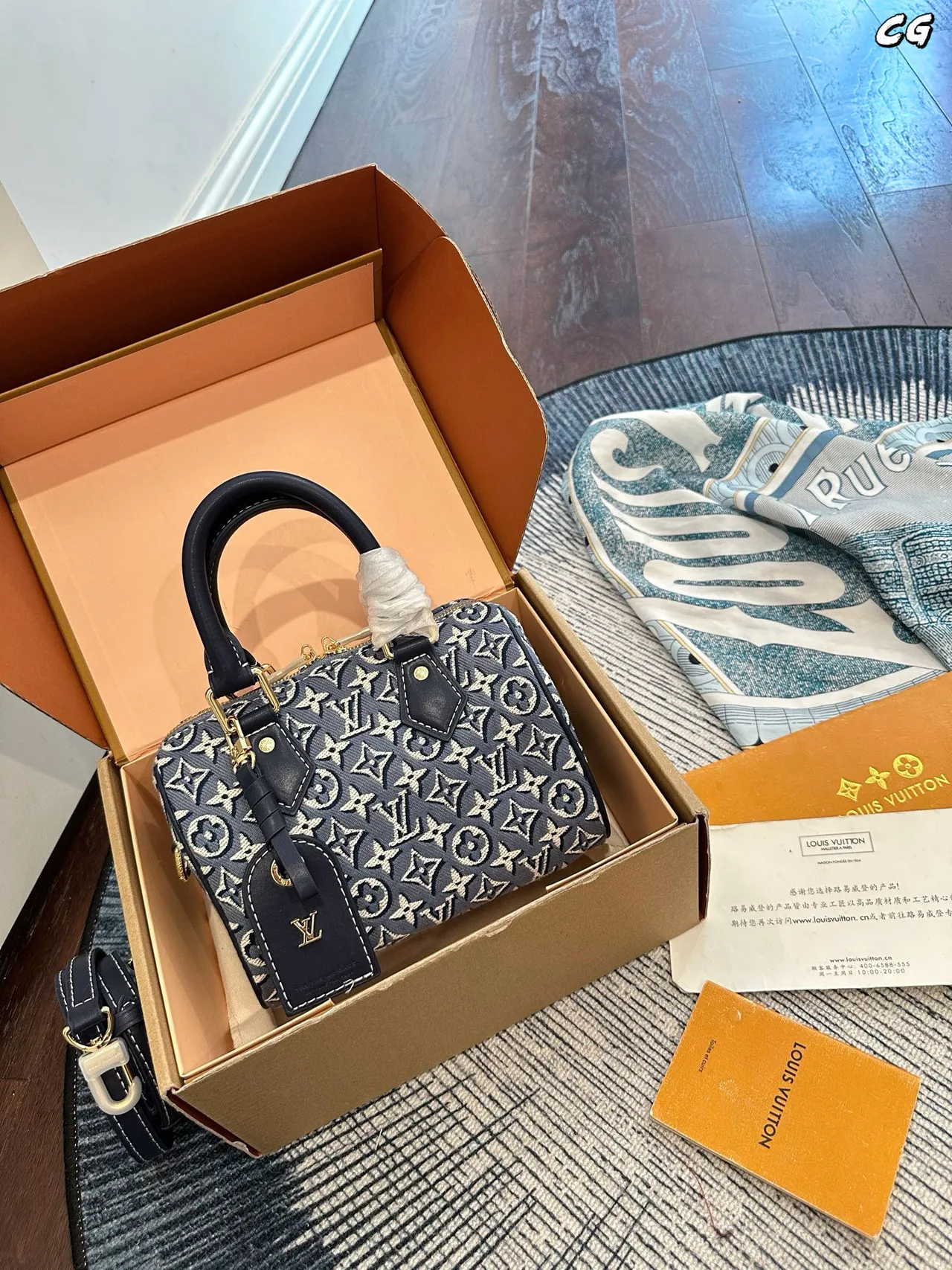 Louis Vuitton Canvas Denim Monogram Glossy Top-Handle Bag in Blue · view 1