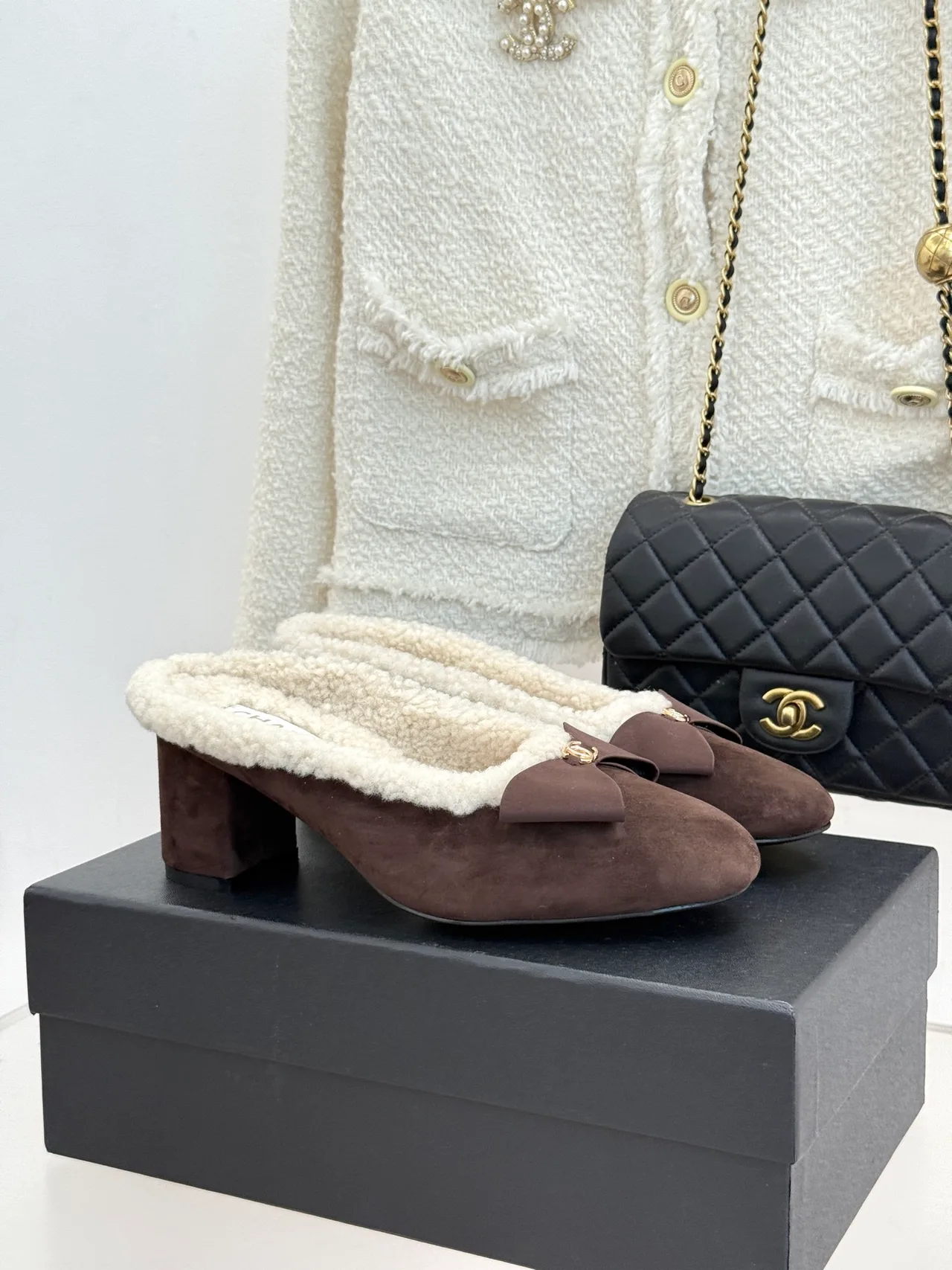 Chanel Slippers in Brown · view 1