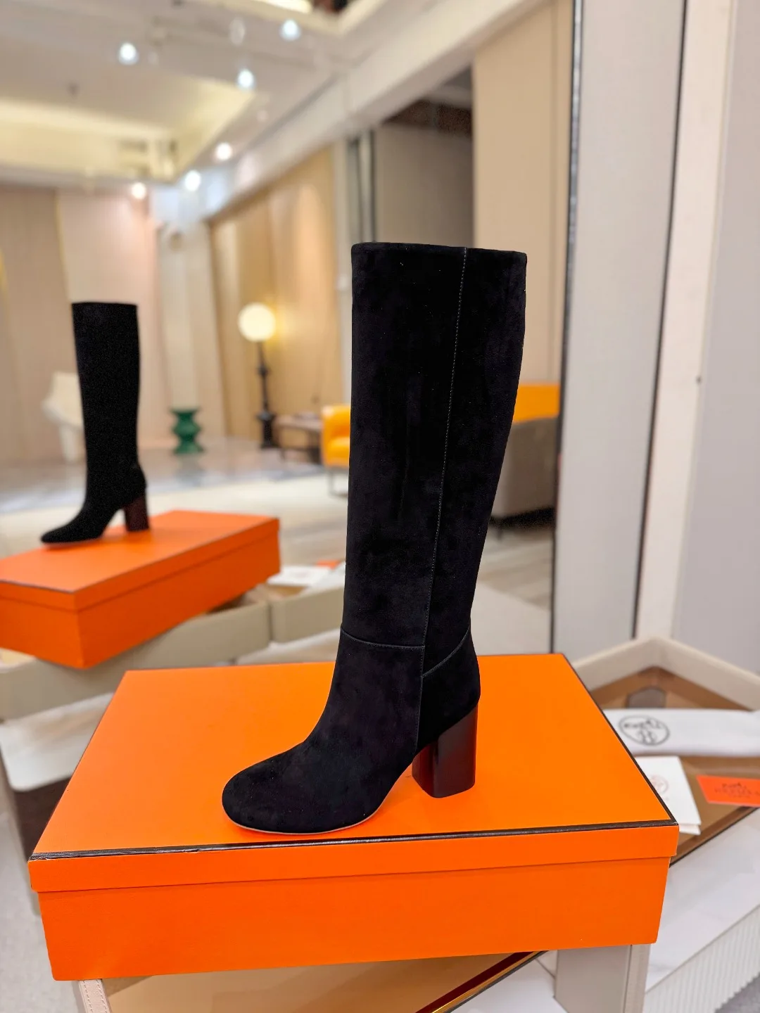 Saint Laurent Cowhide Knee-High Boots in Black · view 1