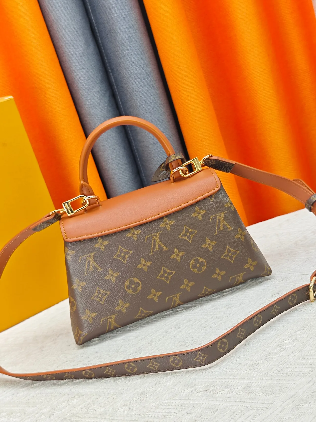 Louis Vuitton Canvas Madeleine BB Handbag in Brown · view 3