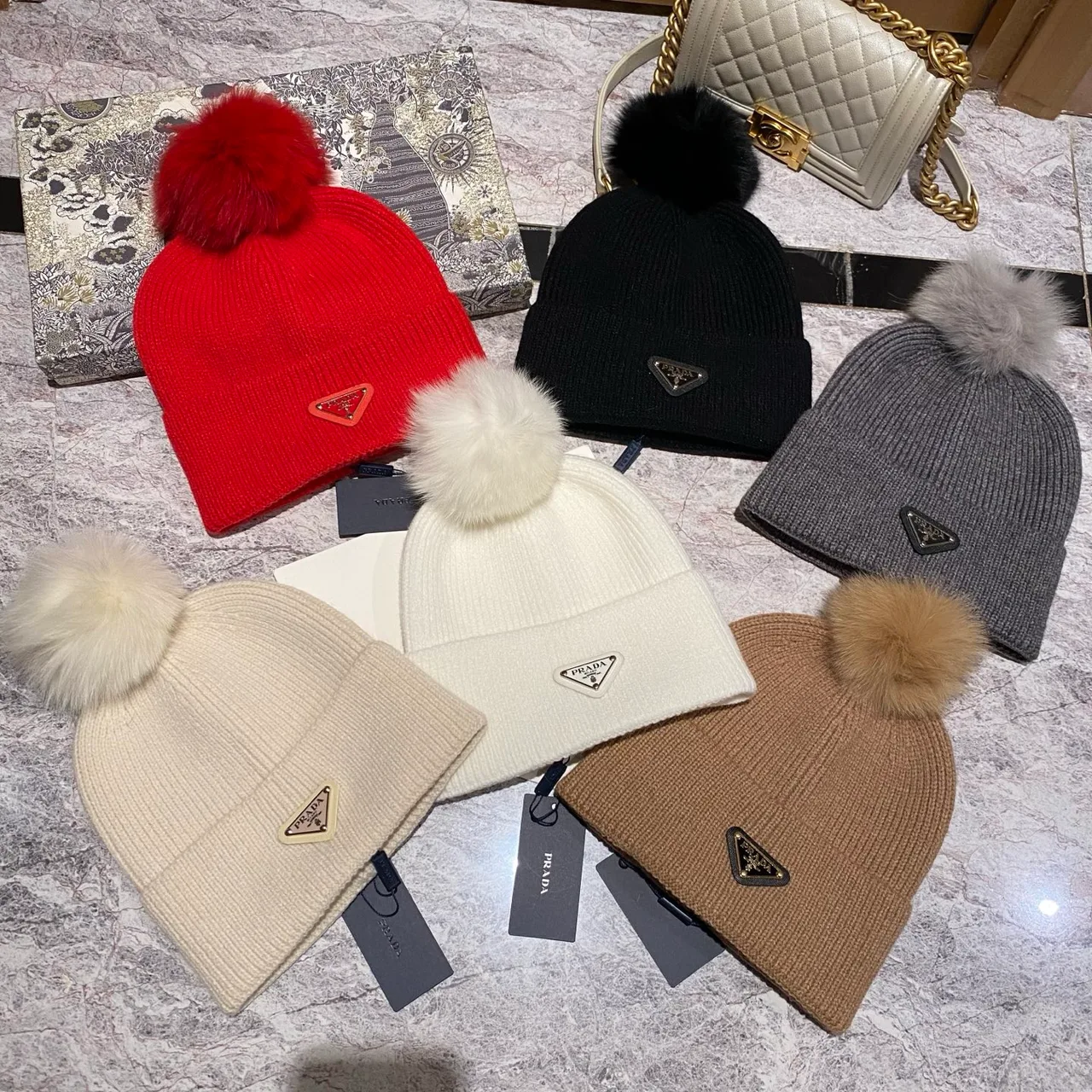 Prada Pom-Pom Beanie in Black & White & Cream & Tan & Grey & Red · view 7
