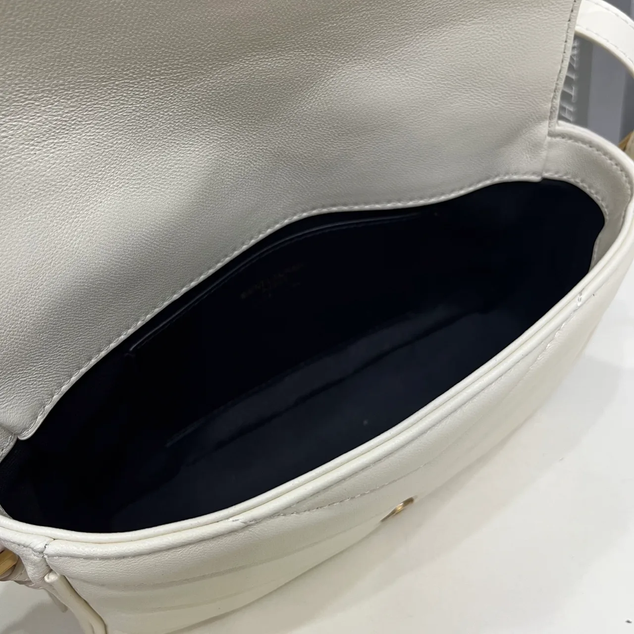 Saint Laurent Sheepskin Quilted Crossbody Bag in White · view 8