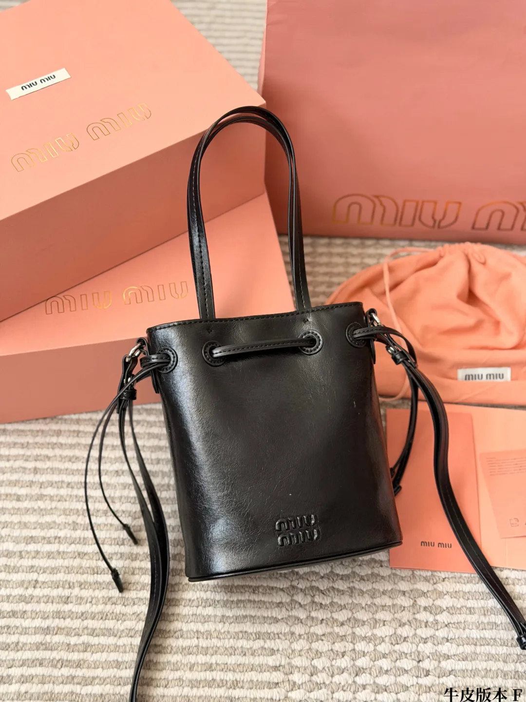 Miu Miu Cowhide Bucket Bag in Black · view 3