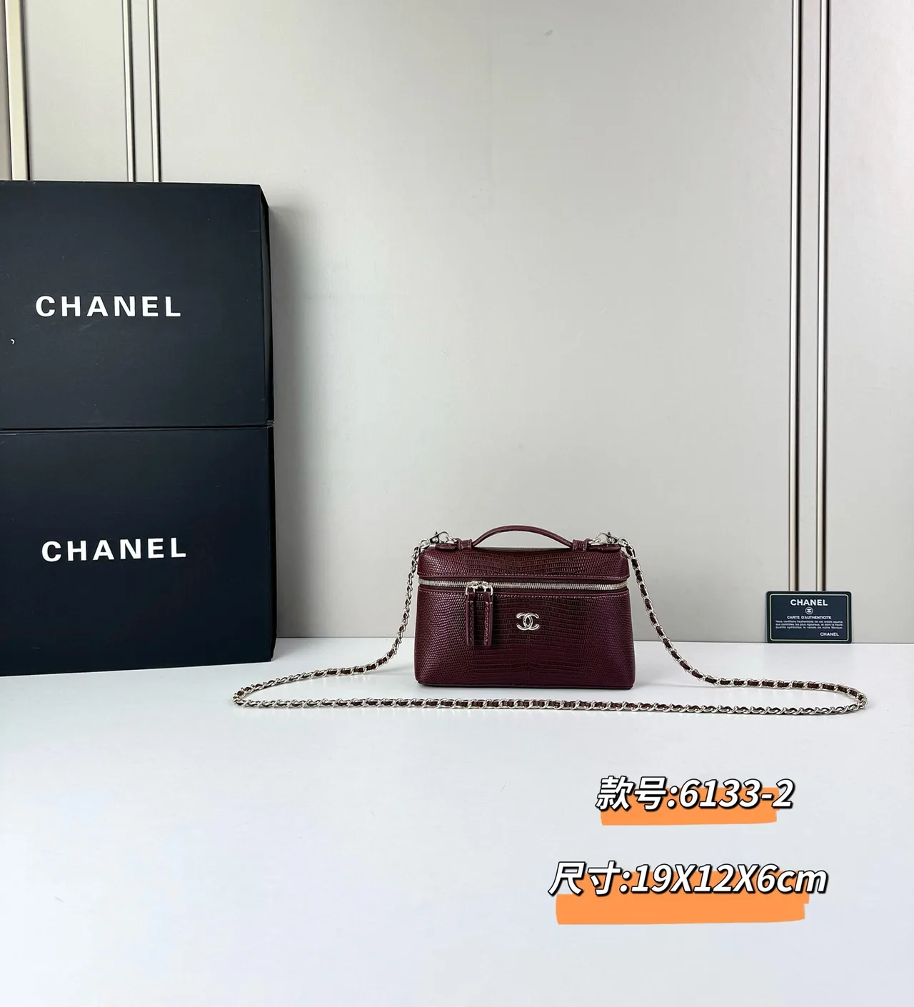 Chanel Cowhide Top-Handle Clutch in Burgundy · view 2