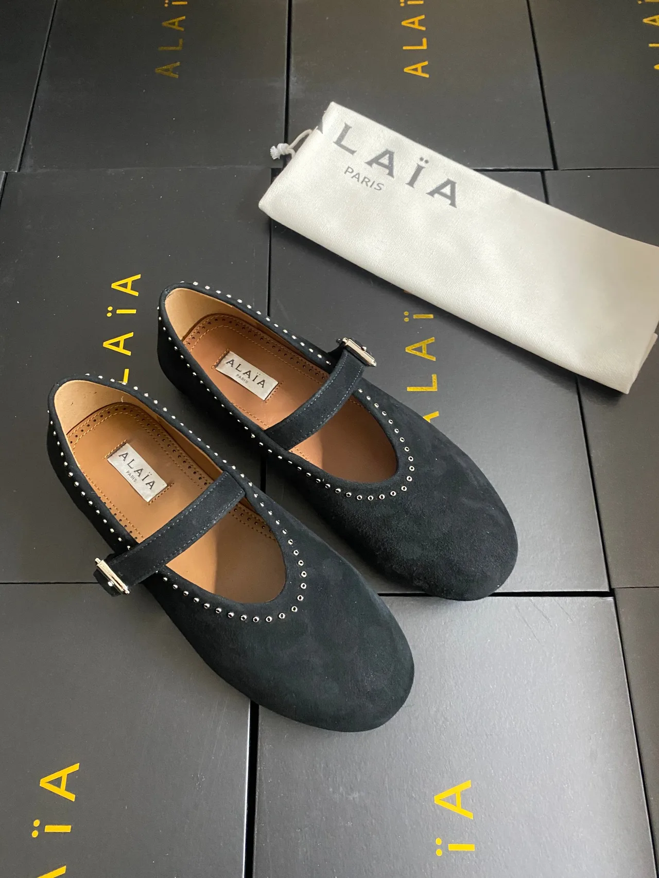 Alaia Cowhide Sheepskin Suede-Look Buckle Ballet Flats in Black · view 2