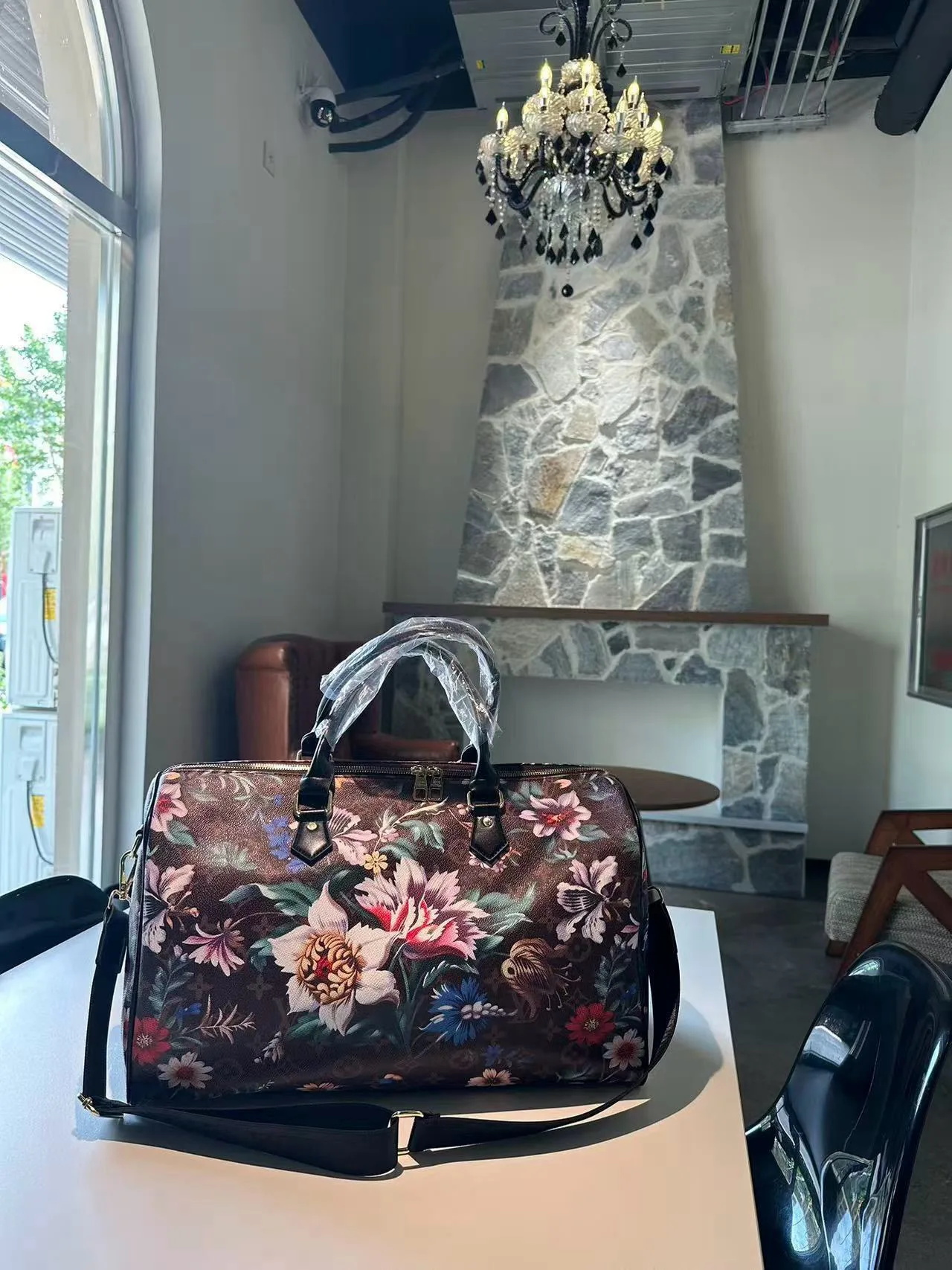 Louis Vuitton Floral Monogram Duffel Bag in Brown · view 7