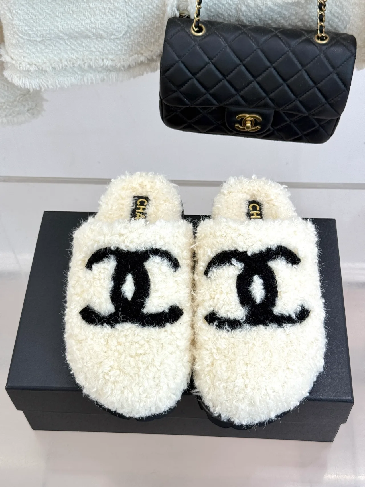 Chanel Denim Slippers in White · view 1