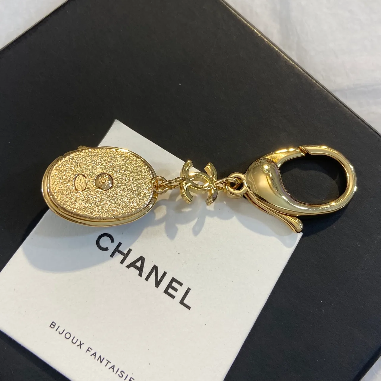 Chanel Face Keychain in Black · view 4