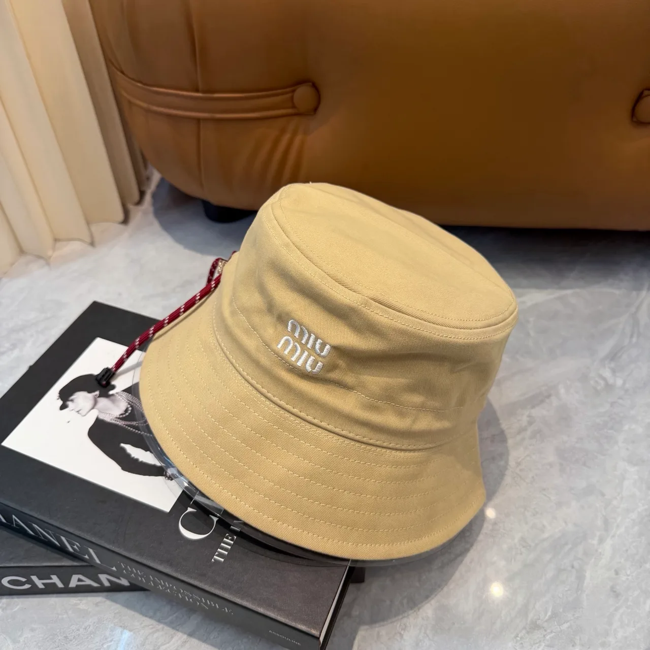 Miu Miu Bucket Hat in Beige · view 5