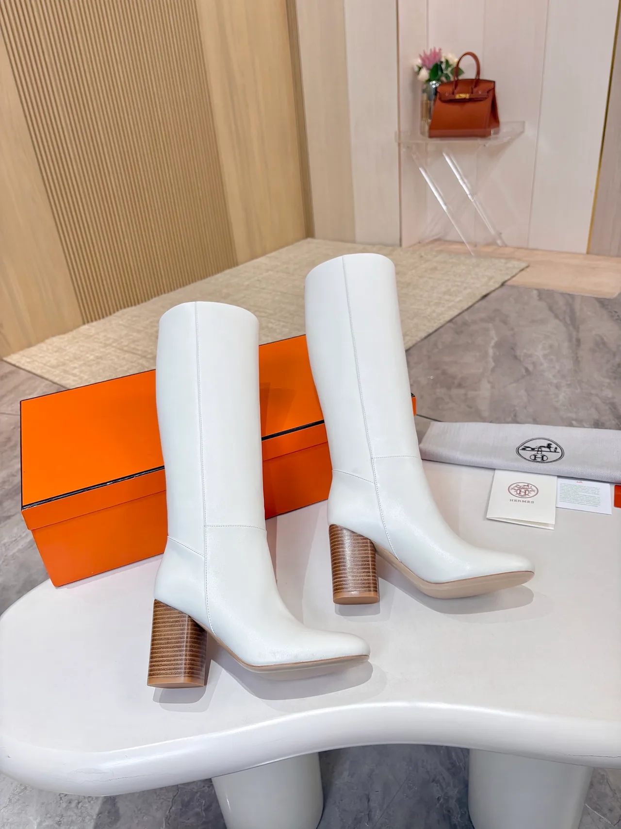 Hermes Cowhide Glossy Knee-High Boots in White · view 1