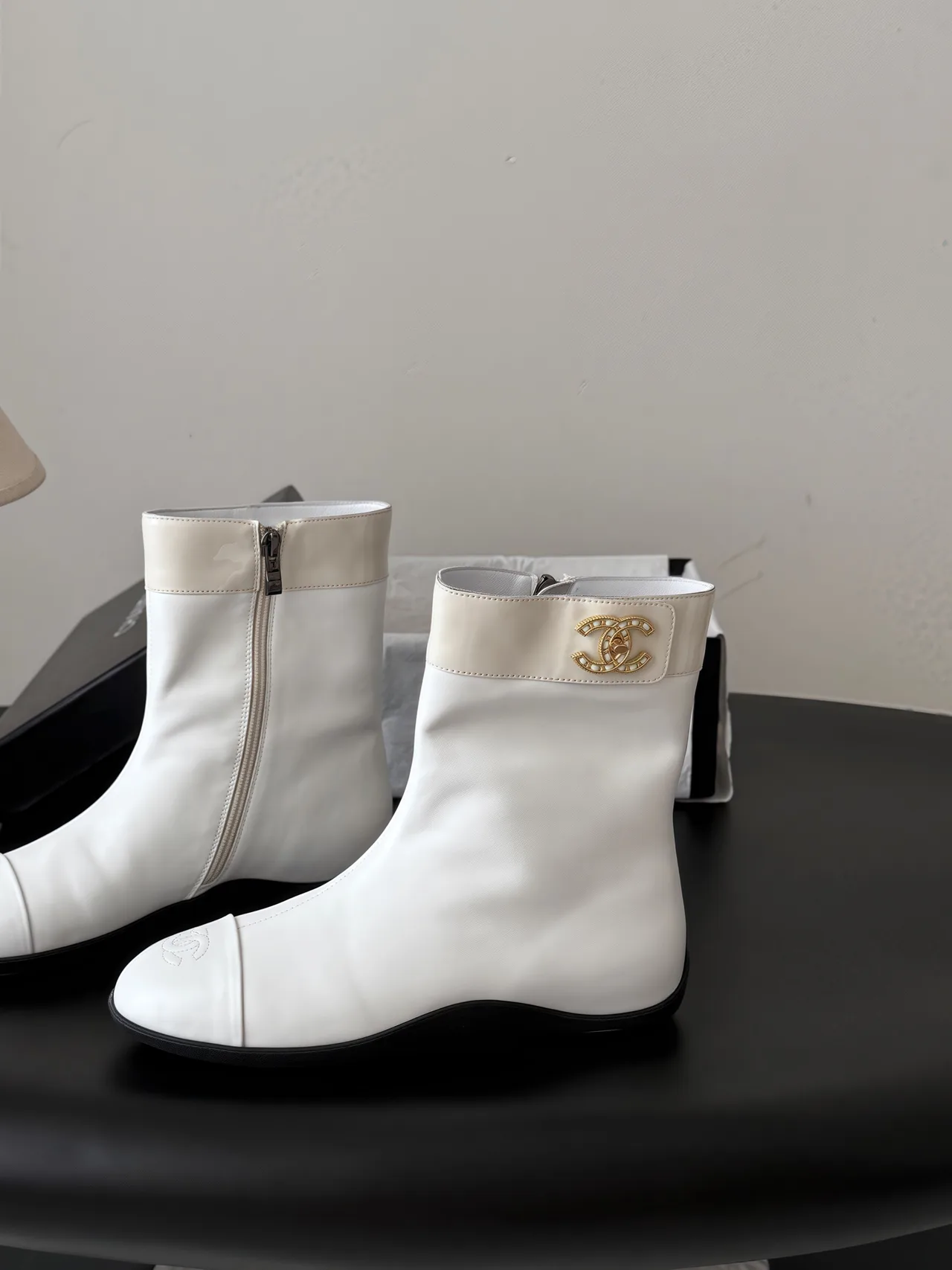 Chanel Cowhide Glossy Ankle Boots in White · view 2