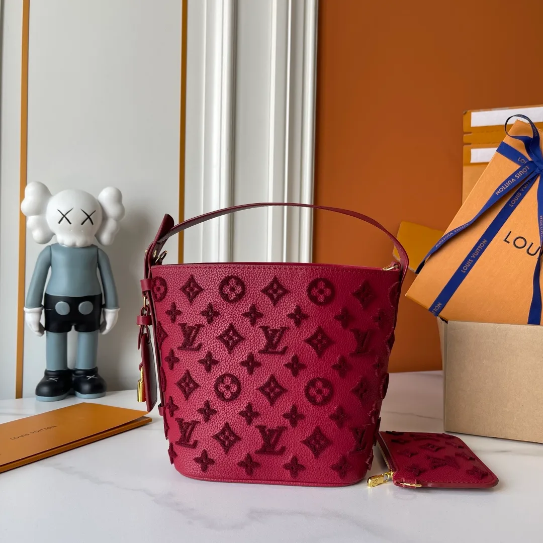 Louis Vuitton Cowhide Bucket Bag in Burgundy · view 3