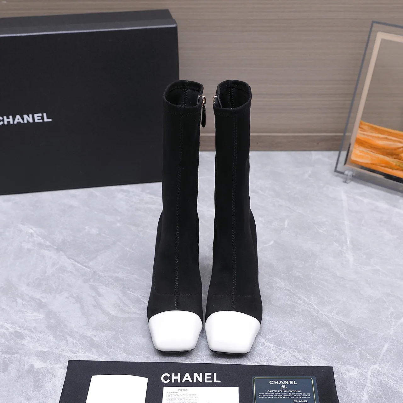 Chanel Cowhide Boots in Black · view 2