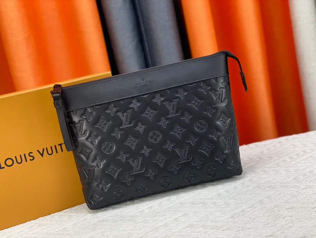 Louis Vuitton Cowhide Clutch in Black · view 1
