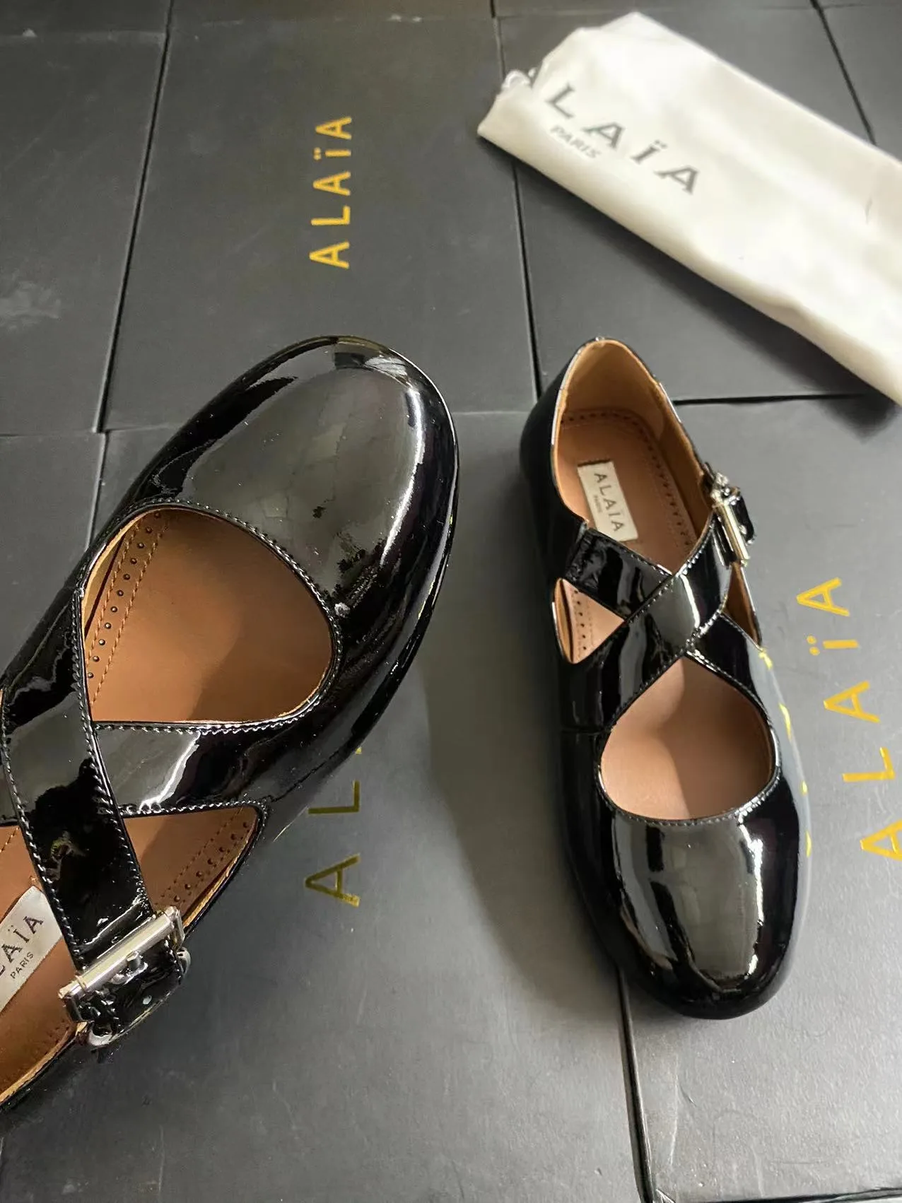 Alaia Cowhide Sheepskin Glossy Square-Toe Mary Jane Flats in Black · view 8