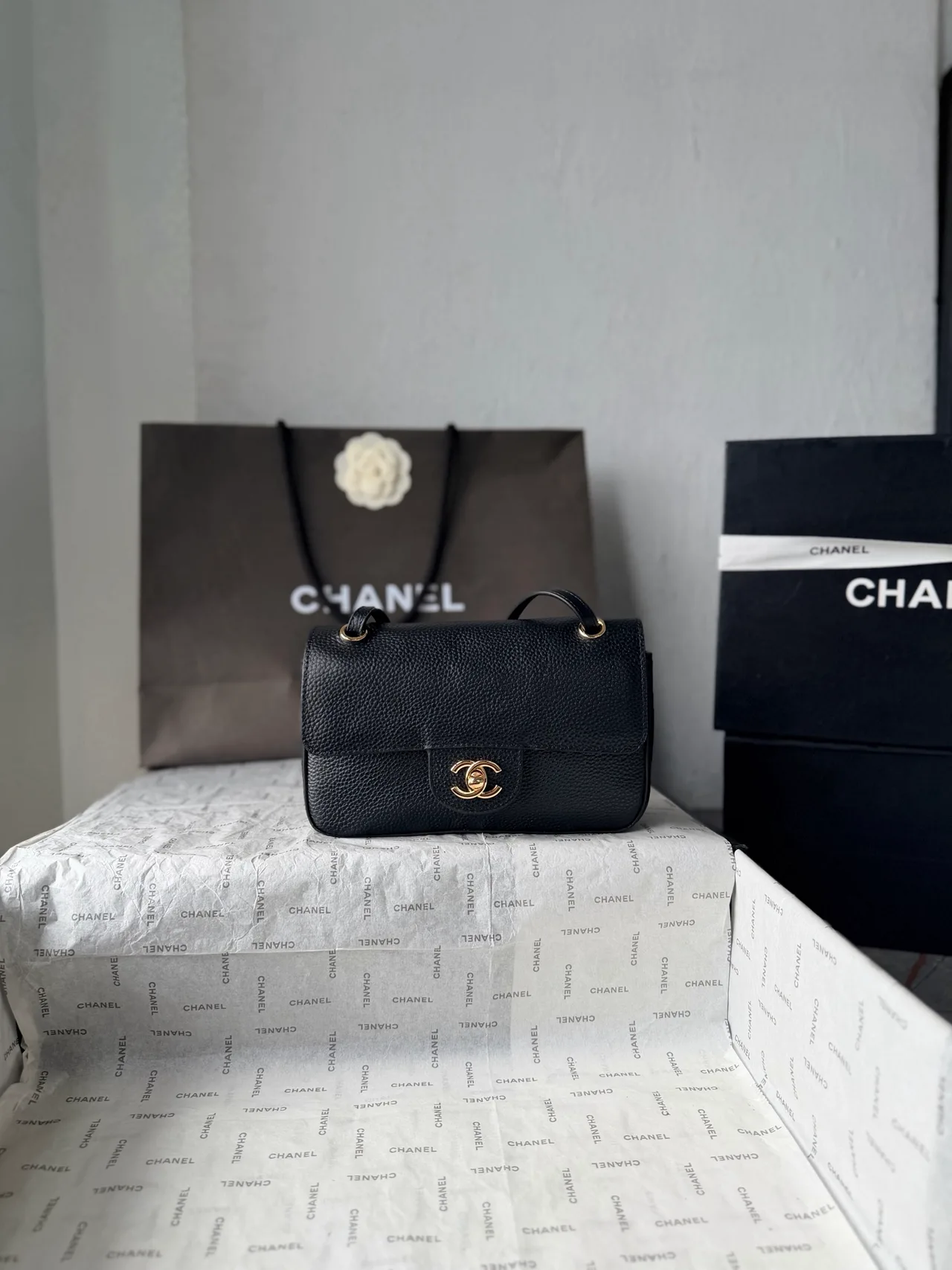 Chanel Cowhide Quilted Clutch in Black · view 1