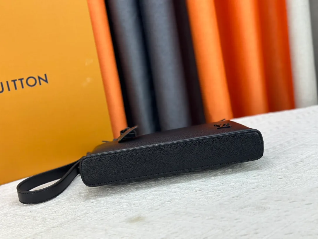 Louis Vuitton Cowhide Clutch in Black · view 5