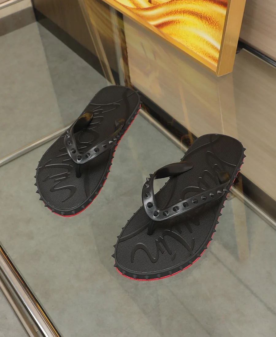 Christian Louboutin Studded Flip-Flops in Black · view 5