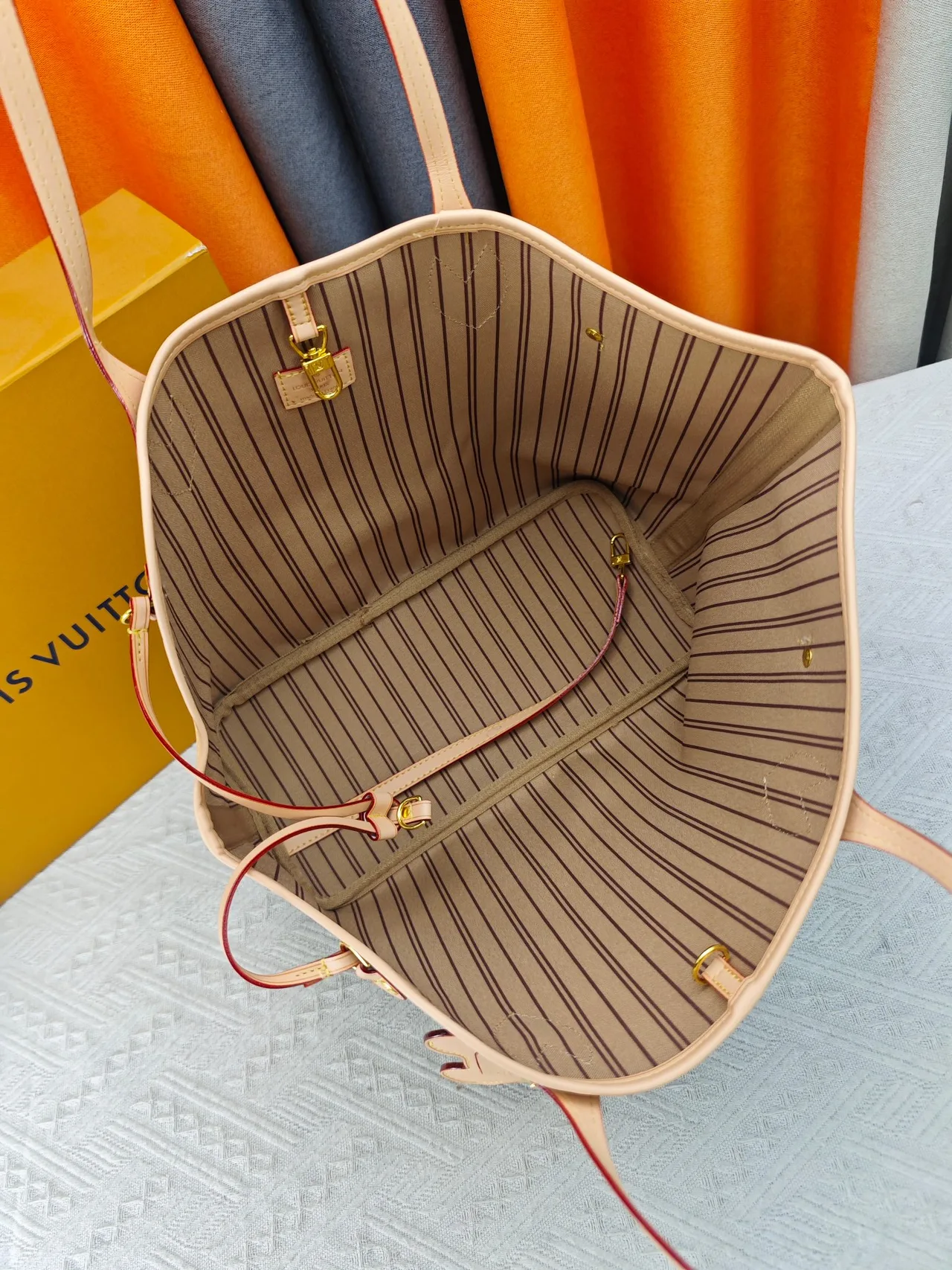 Louis Vuitton Neverfull Canvas Tote in Brown · view 9