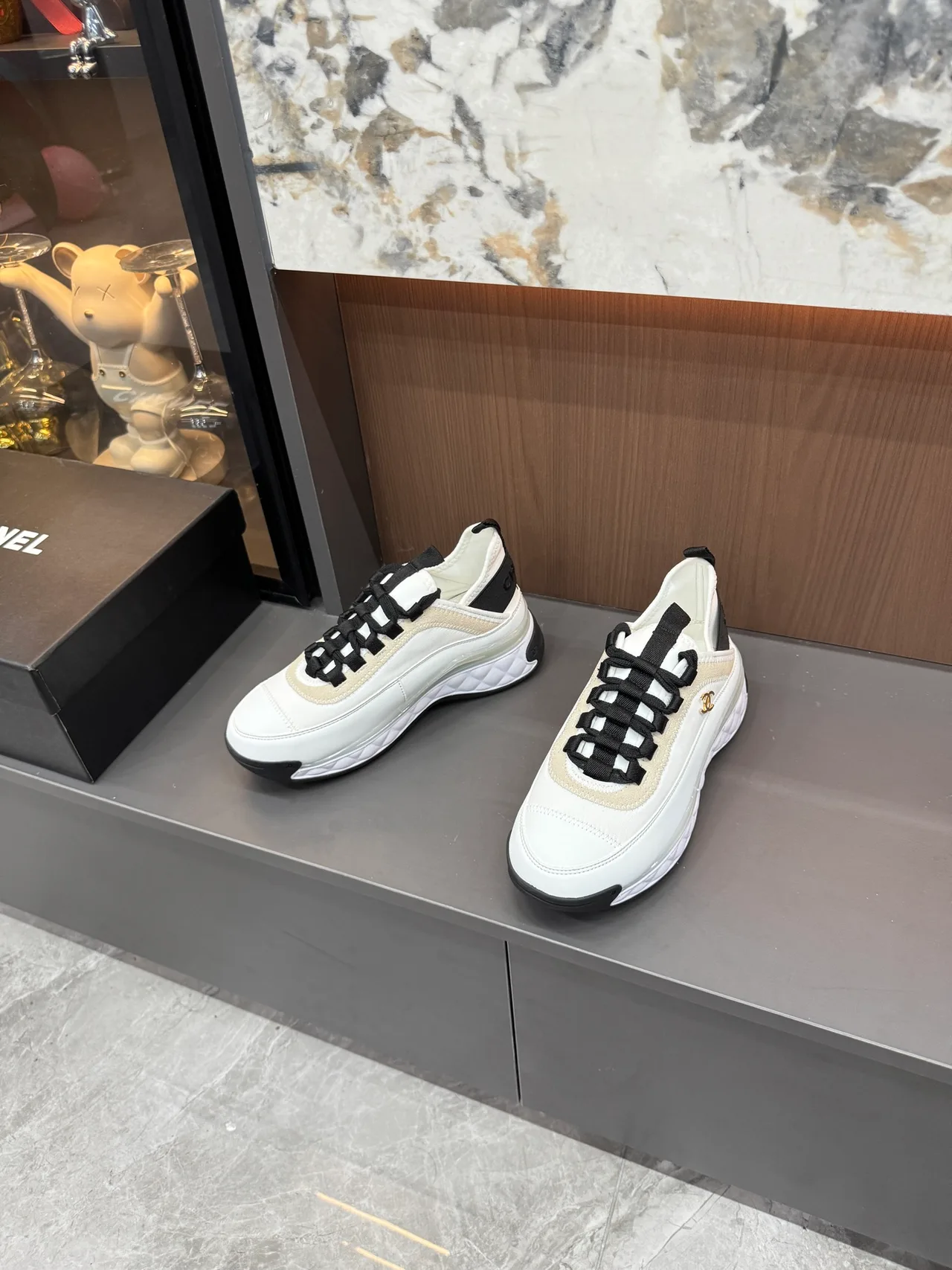 Chanel Cowhide Quilted Lace-Up Sneakers in White · view 5