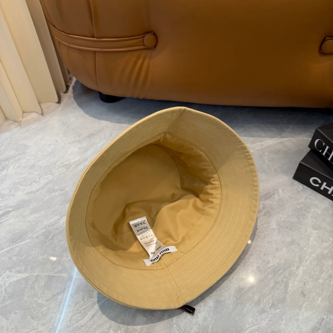 Miu Miu Bucket Hat in Beige · view 7