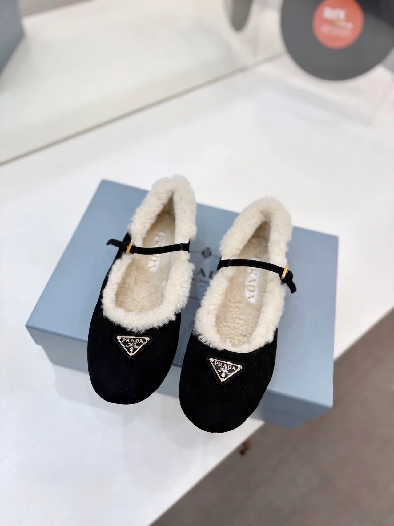 Prada Buckle Fur-Lined Mary Jane Flats in Black · view 3