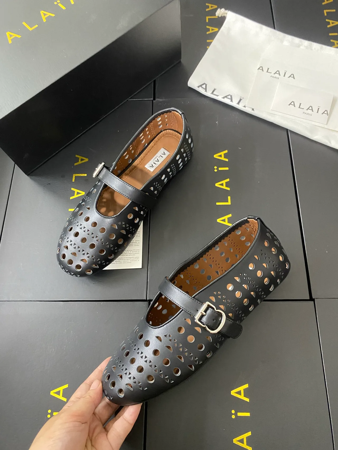Alaia Cowhide Sheepskin Buckle Studded Mary Jane Flats in Black · view 6