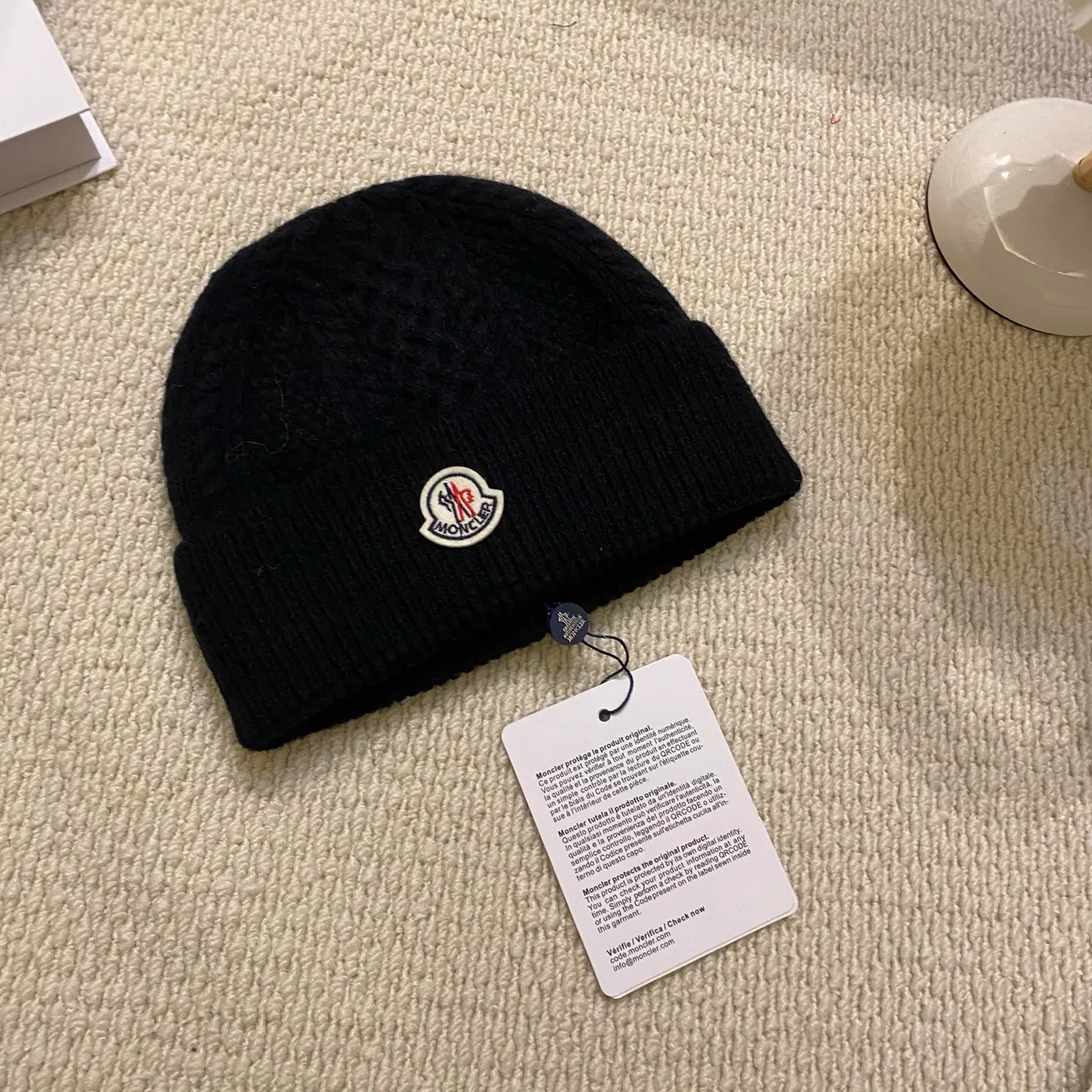 Moncler Ribbed beanie in Black & White & Grey & Burgundy & Brown · view 1