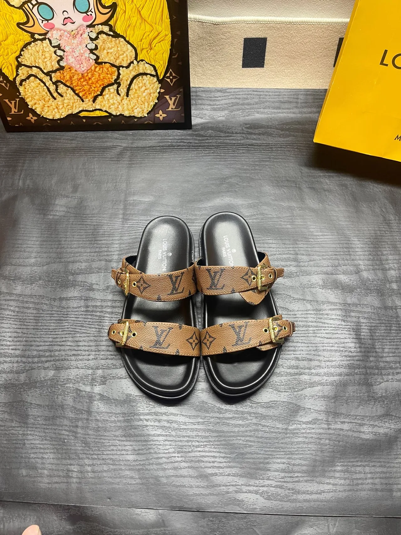 Louis Vuitton Double-strap monogram slides in Black / Brown · view 2