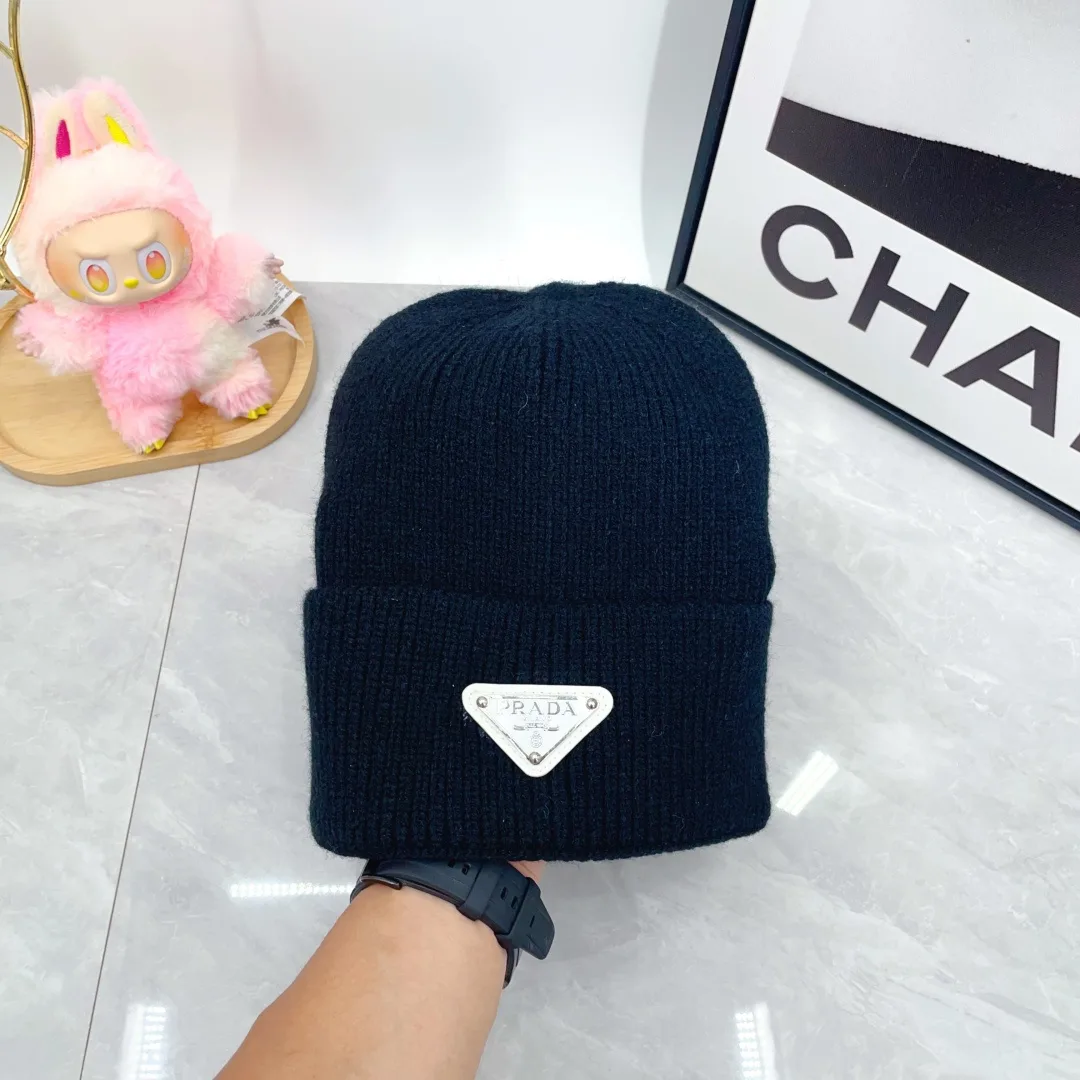 Prada Wool Triangle Logo Knit Beanie in Black · view 1