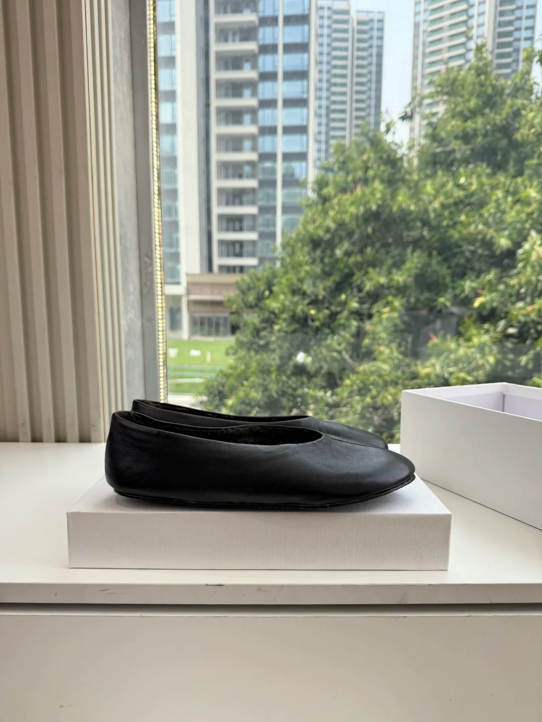 The Row Cowhide Smooth Round-Toe Ballet Flats in Black · view 3