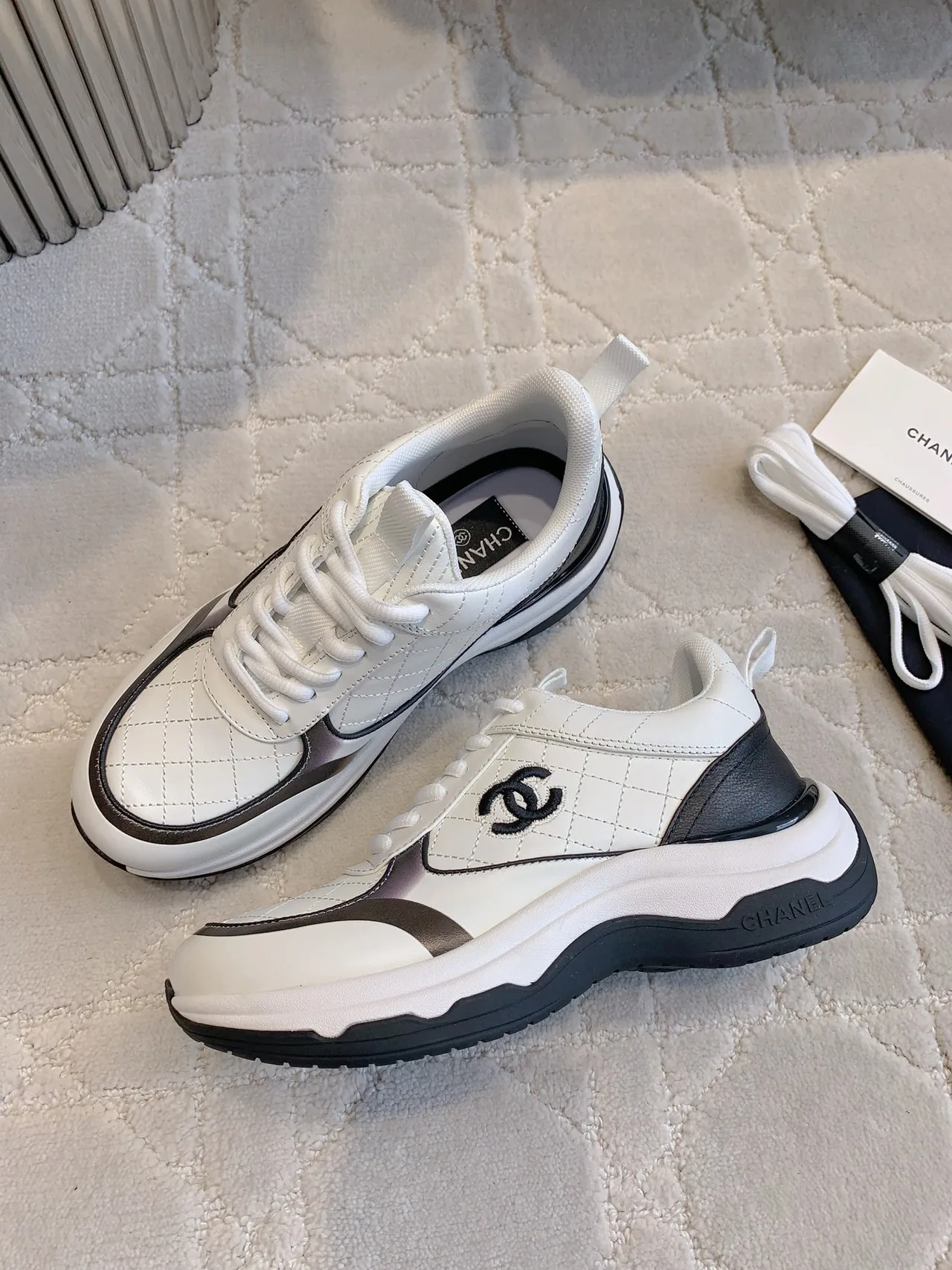 Chanel Quilted Sneakers in White · view 4