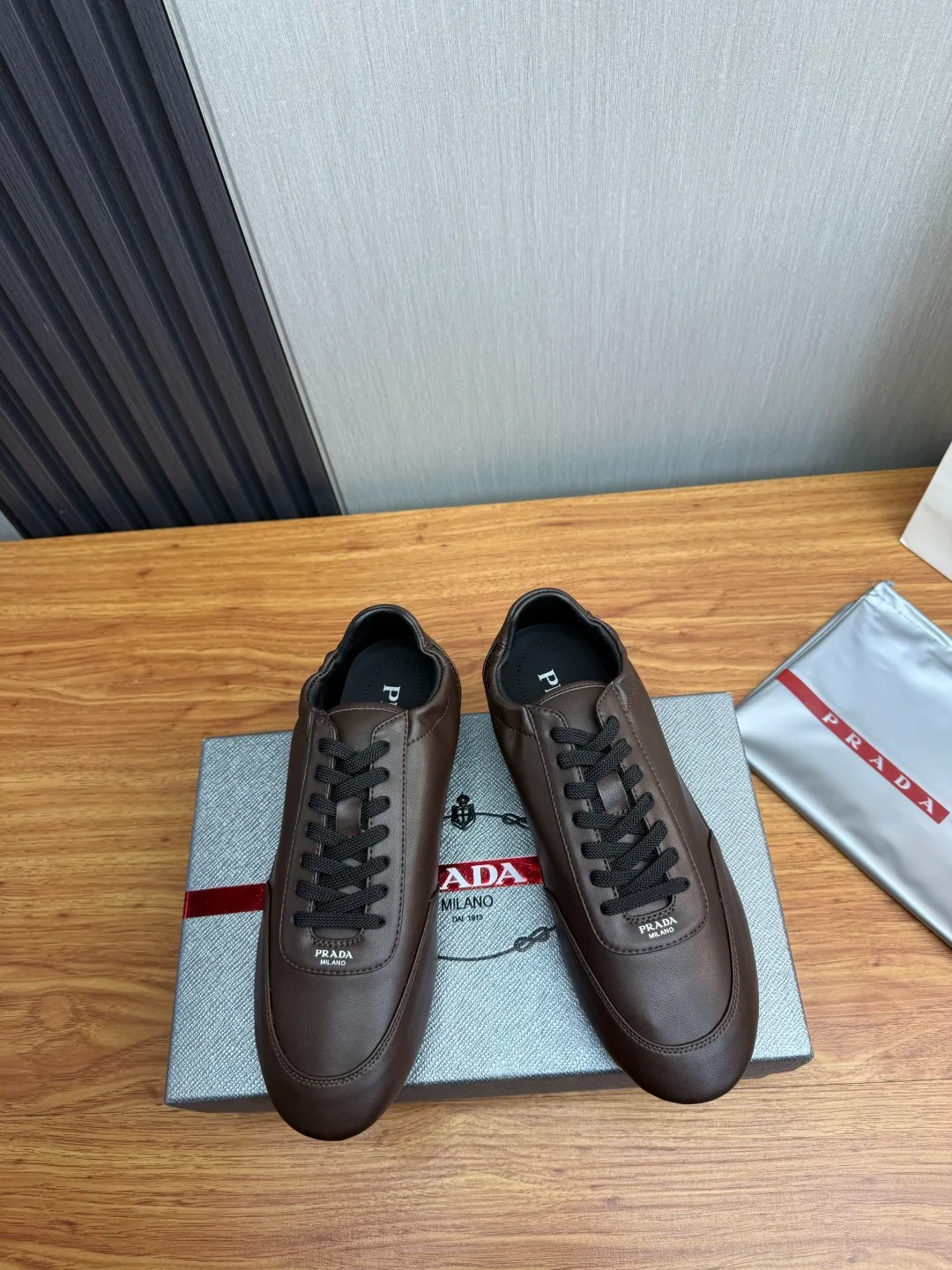 Prada Cowhide Quilted Round-Toe Sneakers in Brown · view 2