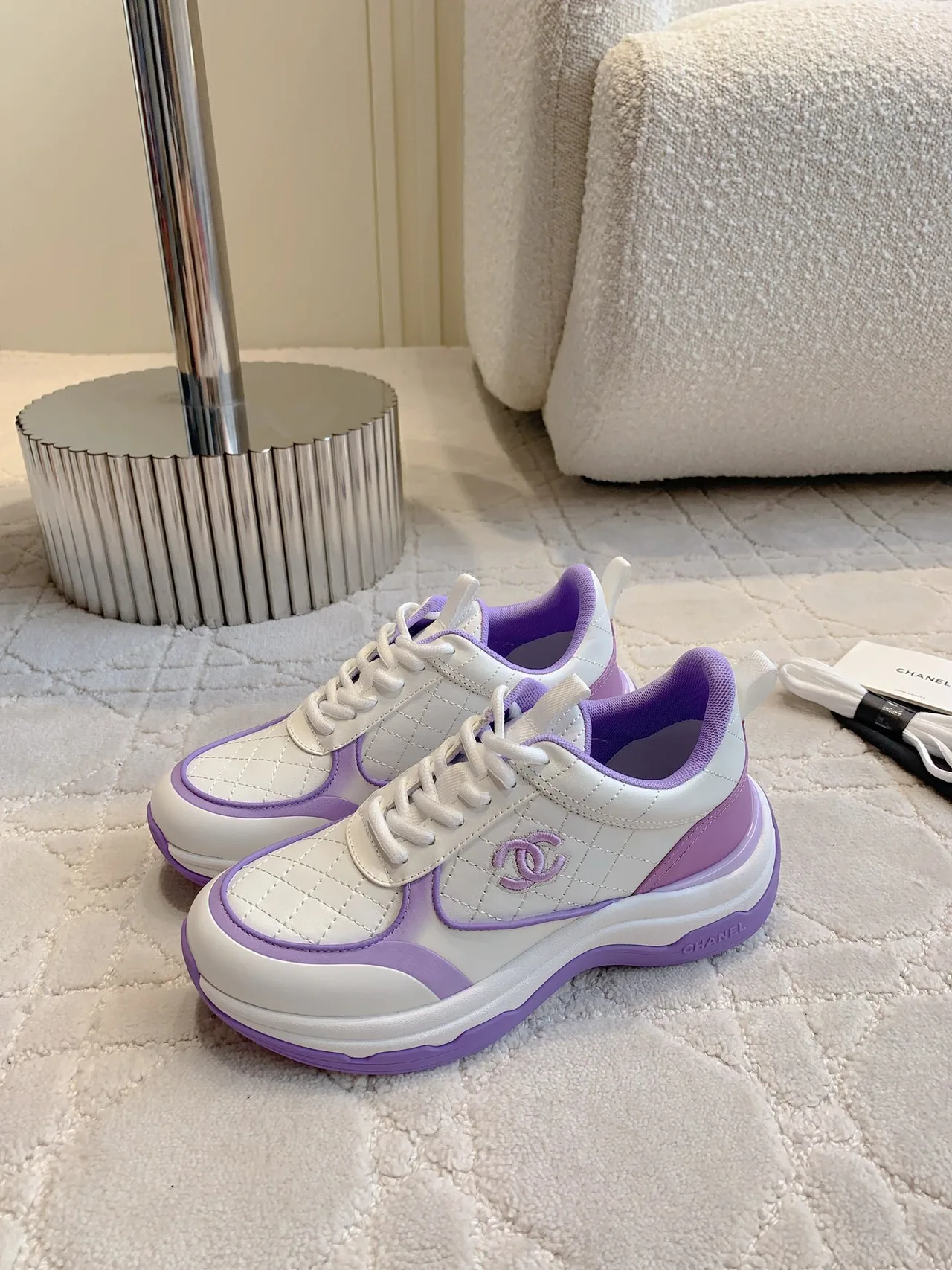 Chanel Quilted Sneakers in White · view 3