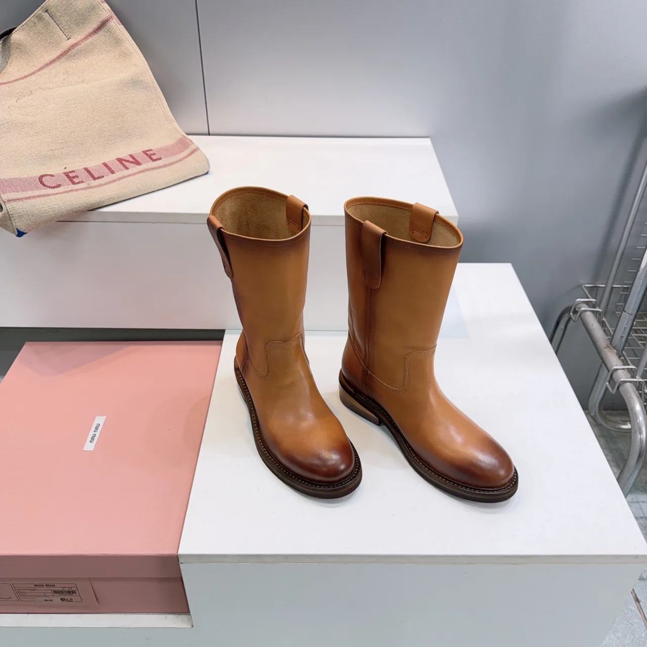 Miu Miu Cowhide Smooth Round-Toe Mid-Calf Boots in Brown · view 7