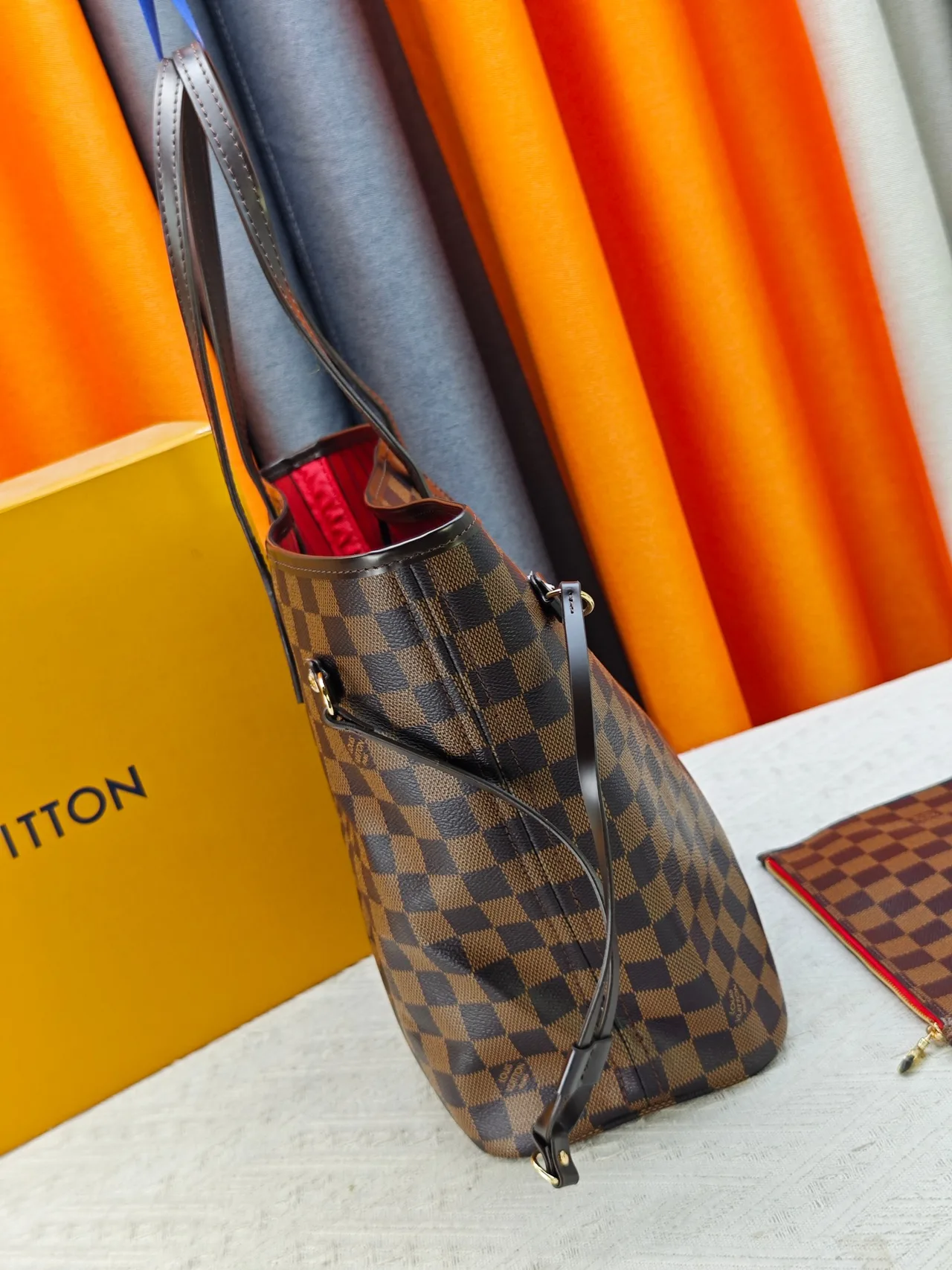 Louis Vuitton Neverfull Clutch in Brown · view 4