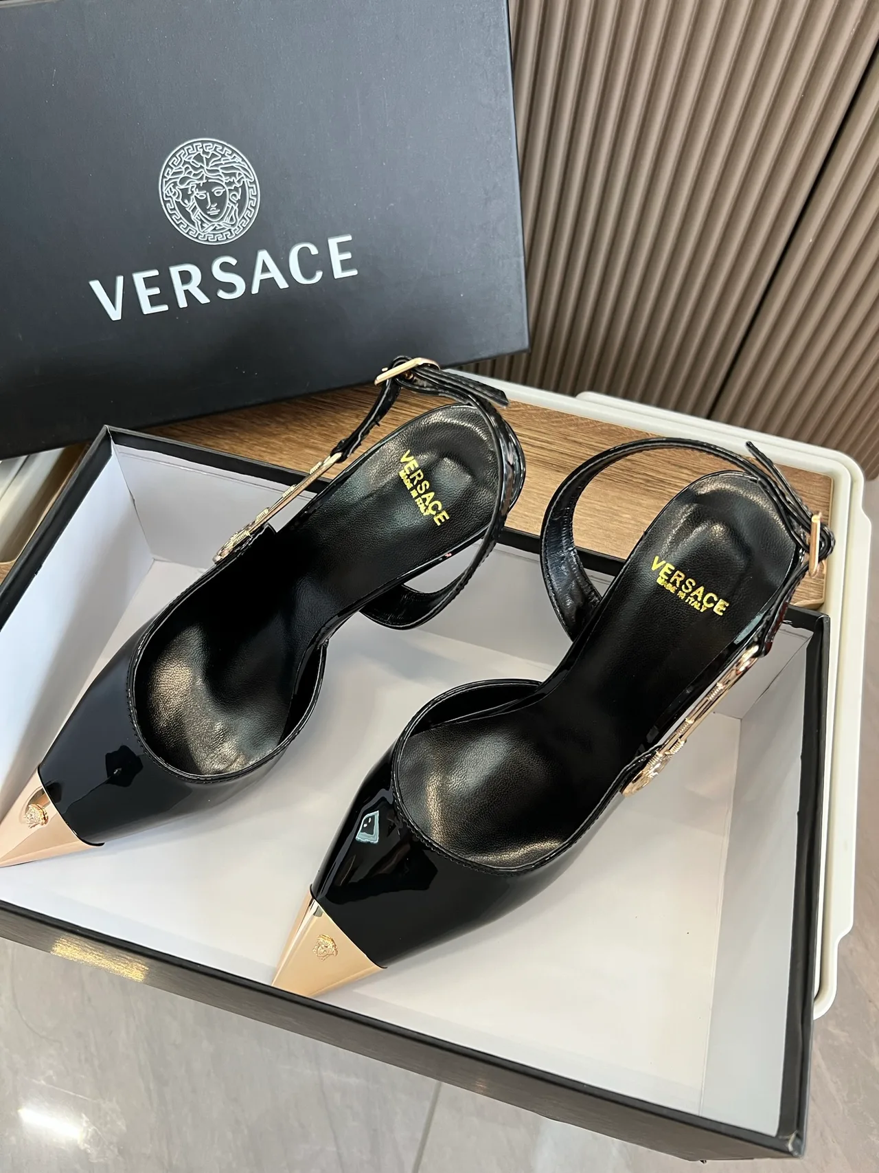 Versace Glossy Pointed-Toe Pointed Slingback Pumps in Black · view 4