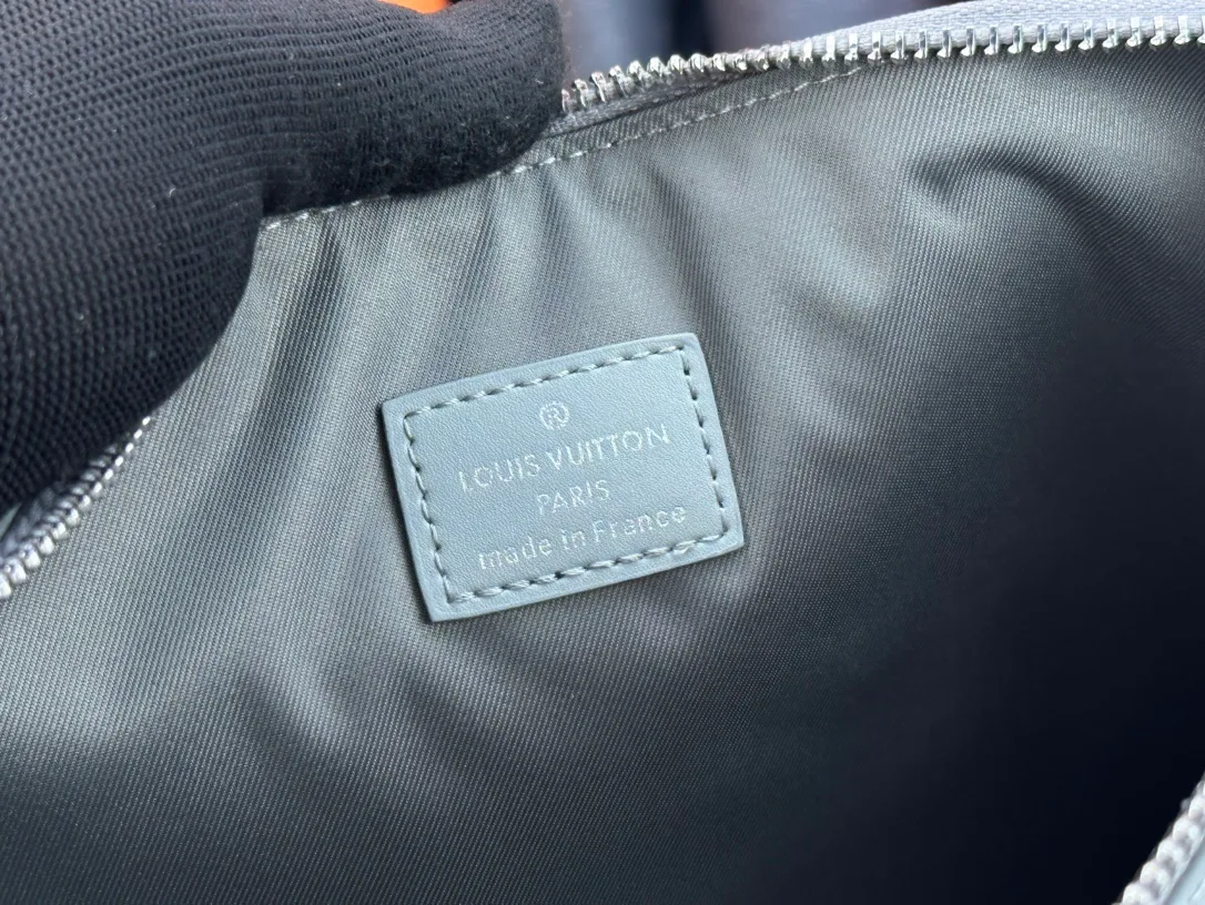 Louis Vuitton Cowhide Clutch in Grey · view 8