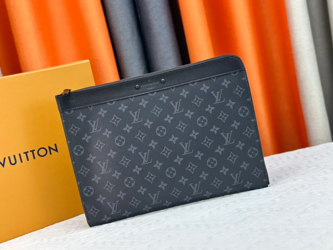 Louis Vuitton Canvas Clutch in Grey · view 1