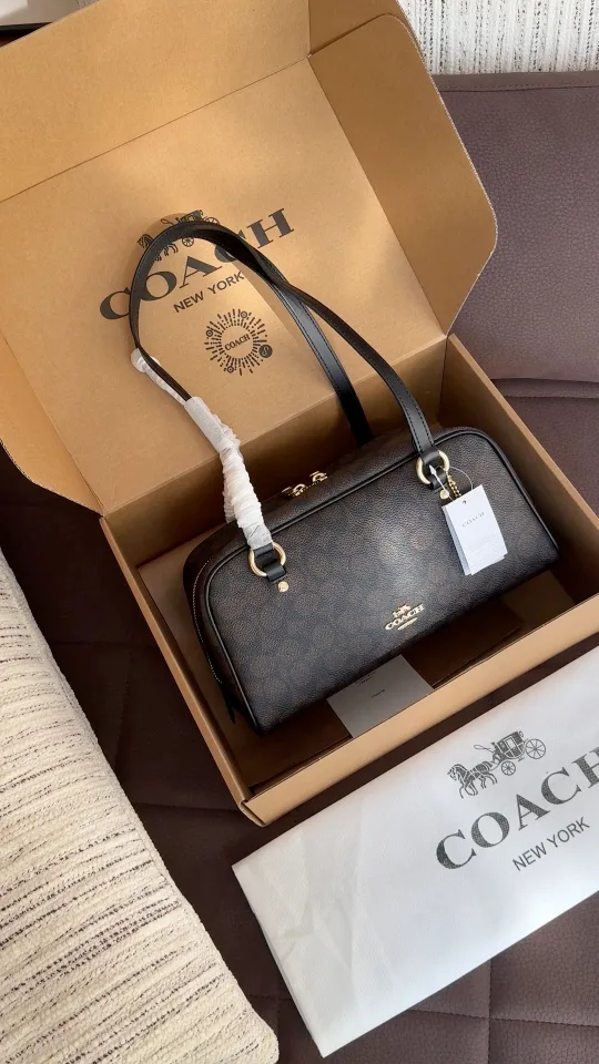 Coach Sydney bowling shoulder bag in Brown / Tan · view 1